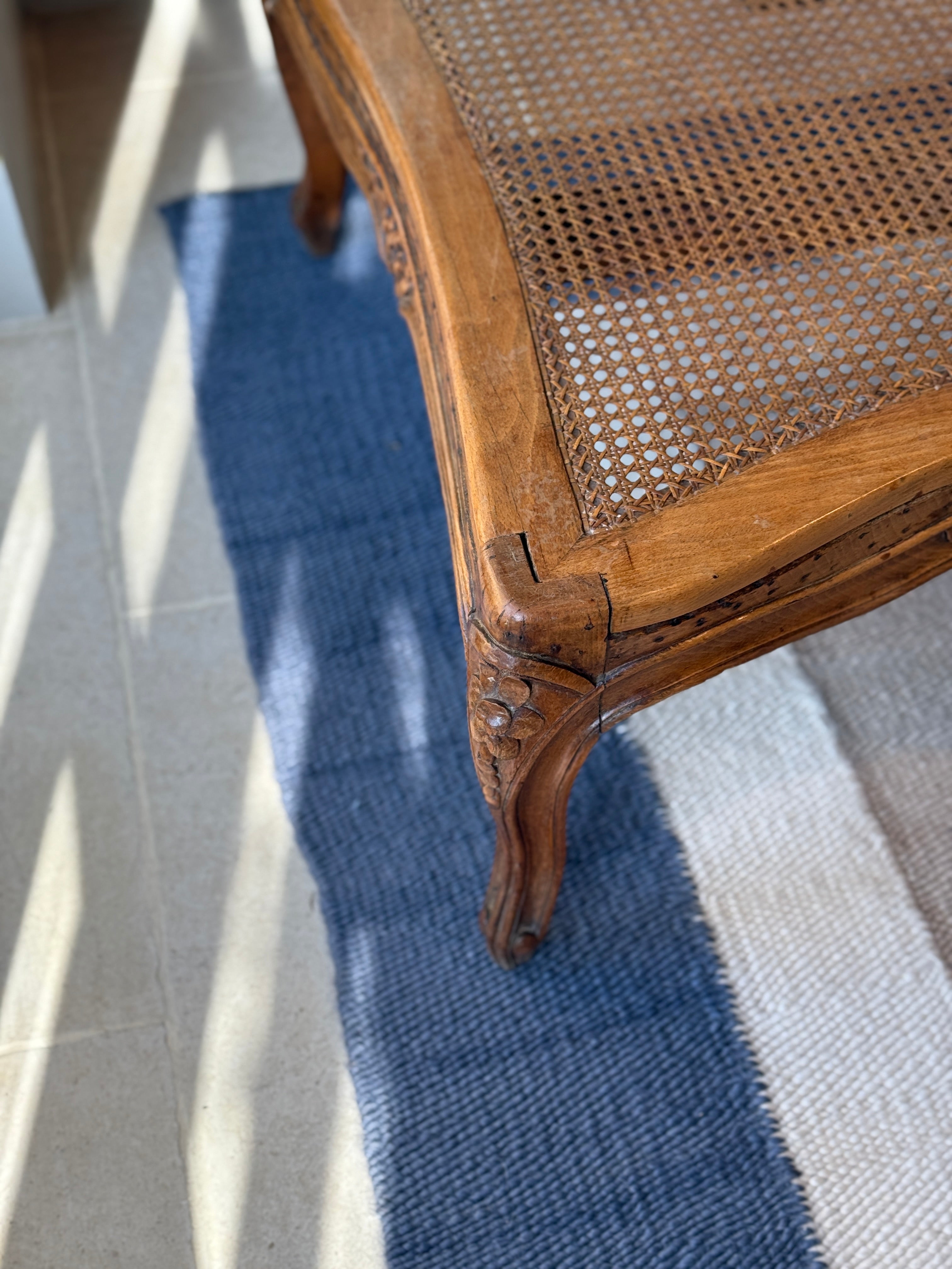 Pair of low French fruitwood and cane coffee table