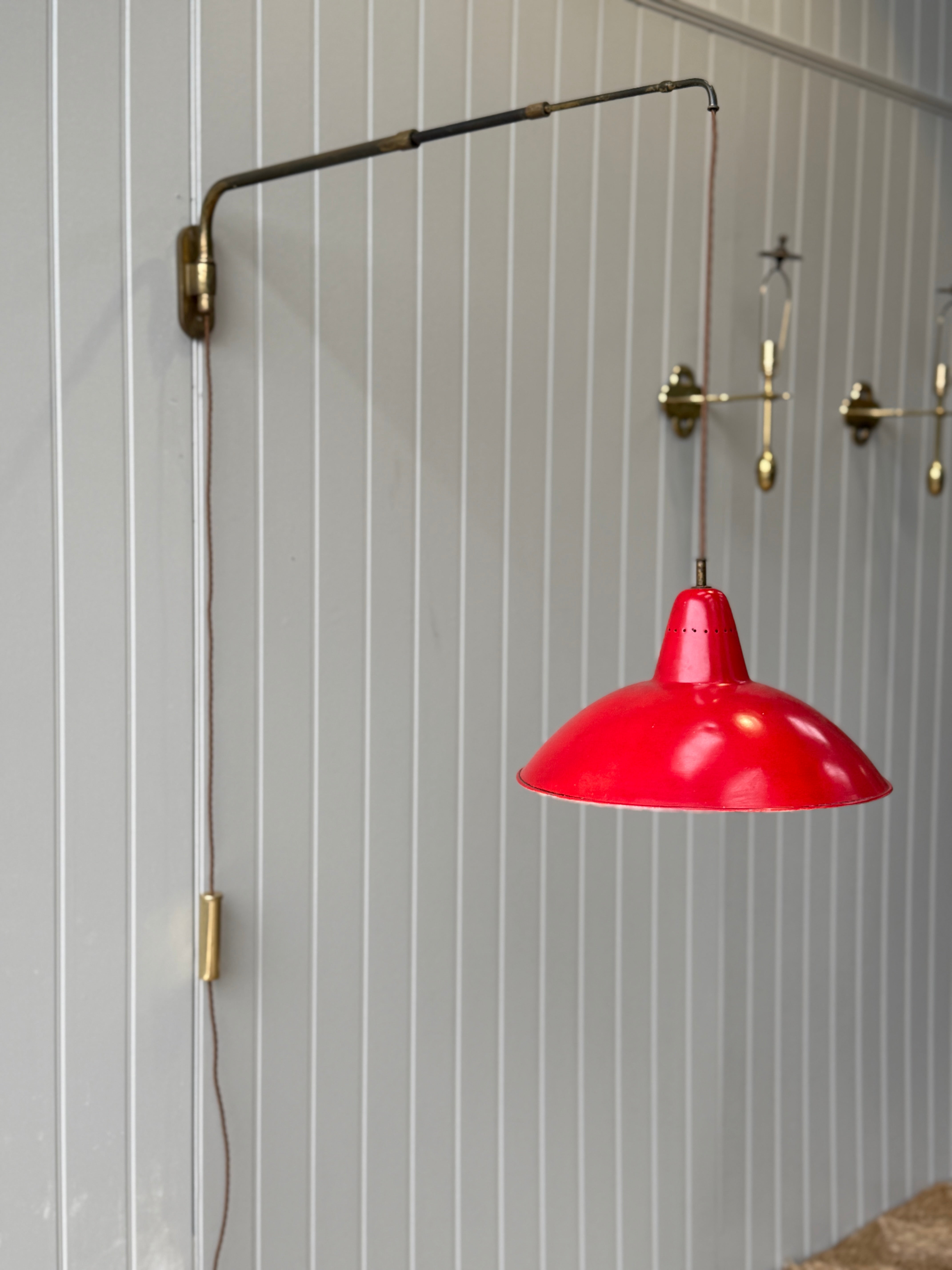 Italian 50s Brass Extending Wall Light with Red Cone Shade.