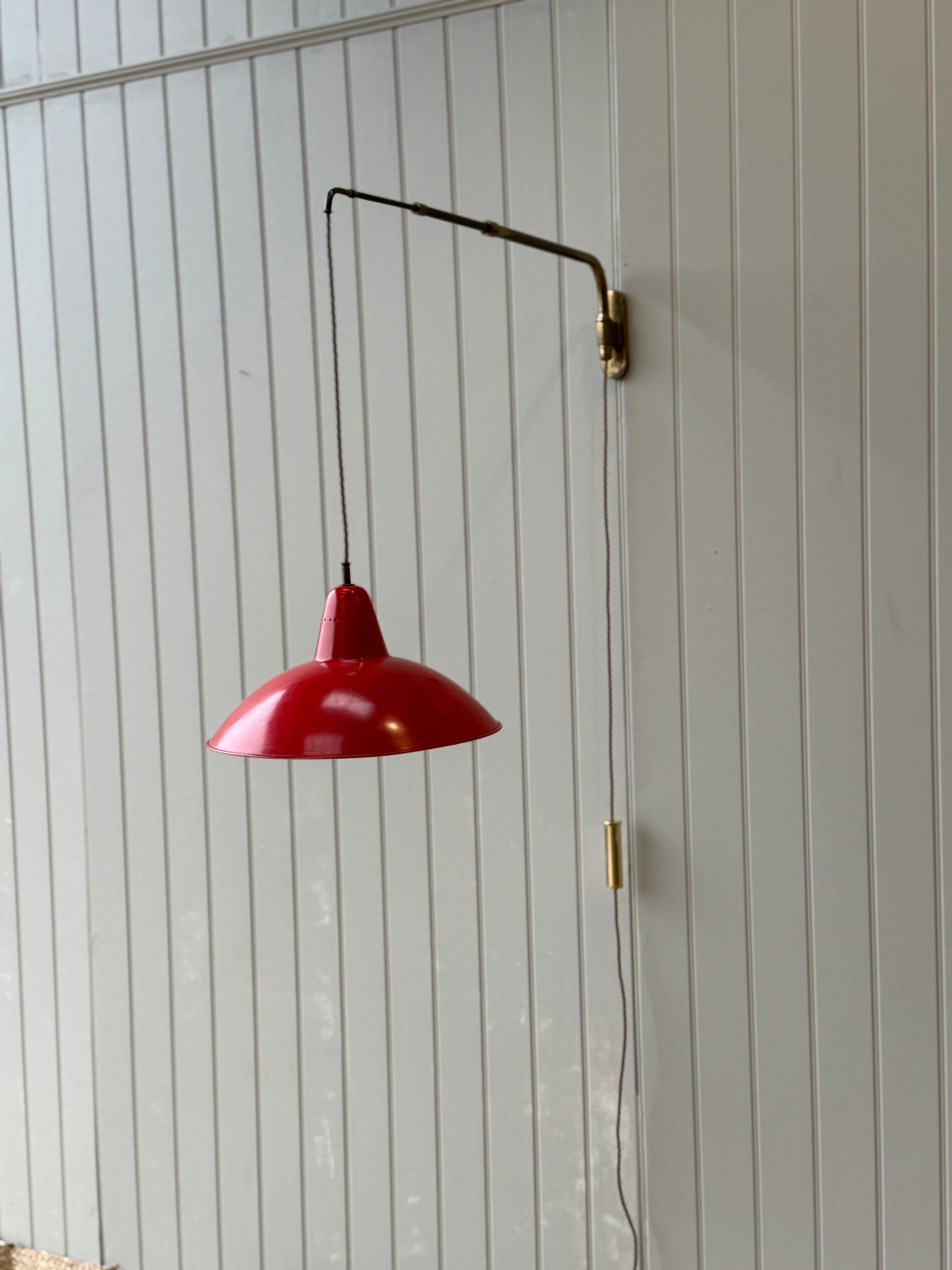 Italian 50s Brass Extending Wall Light with Red Cone Shade.