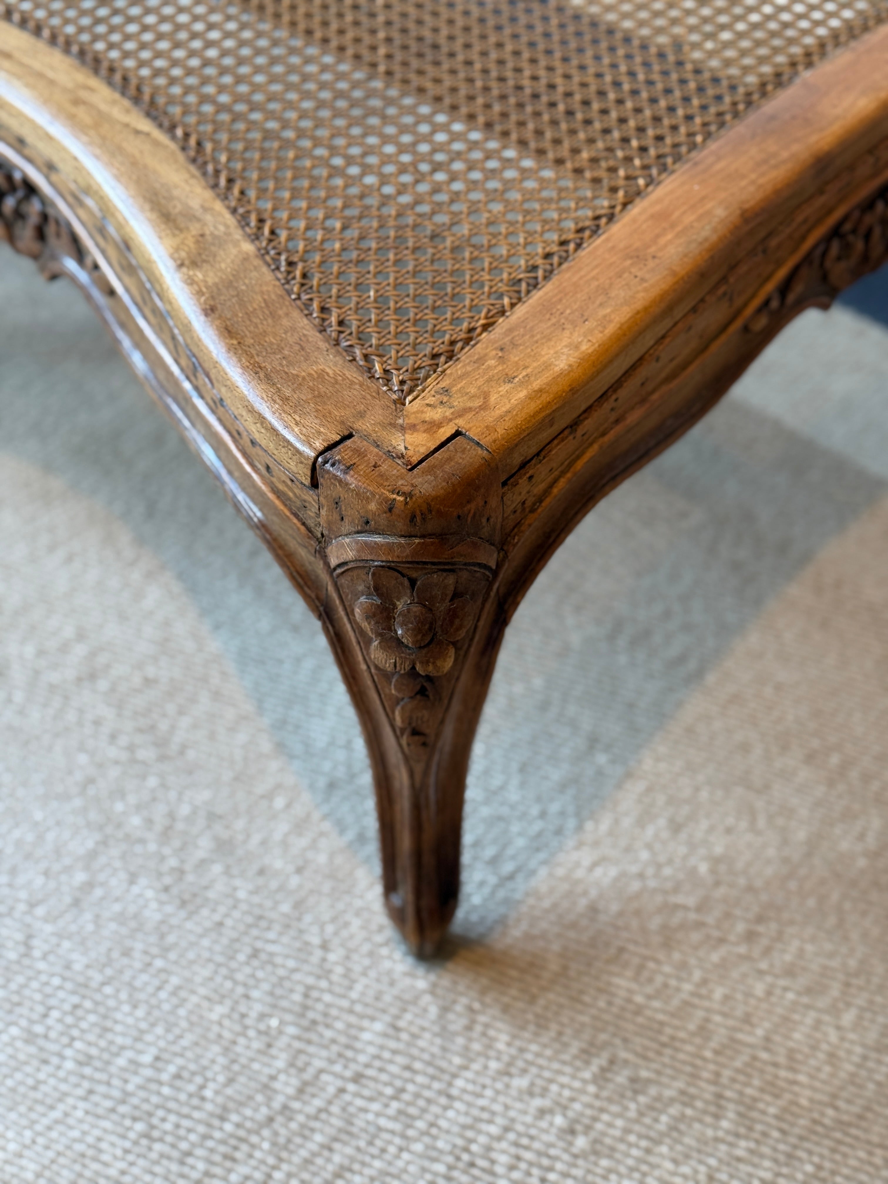 Pair of low French fruitwood and cane coffee table