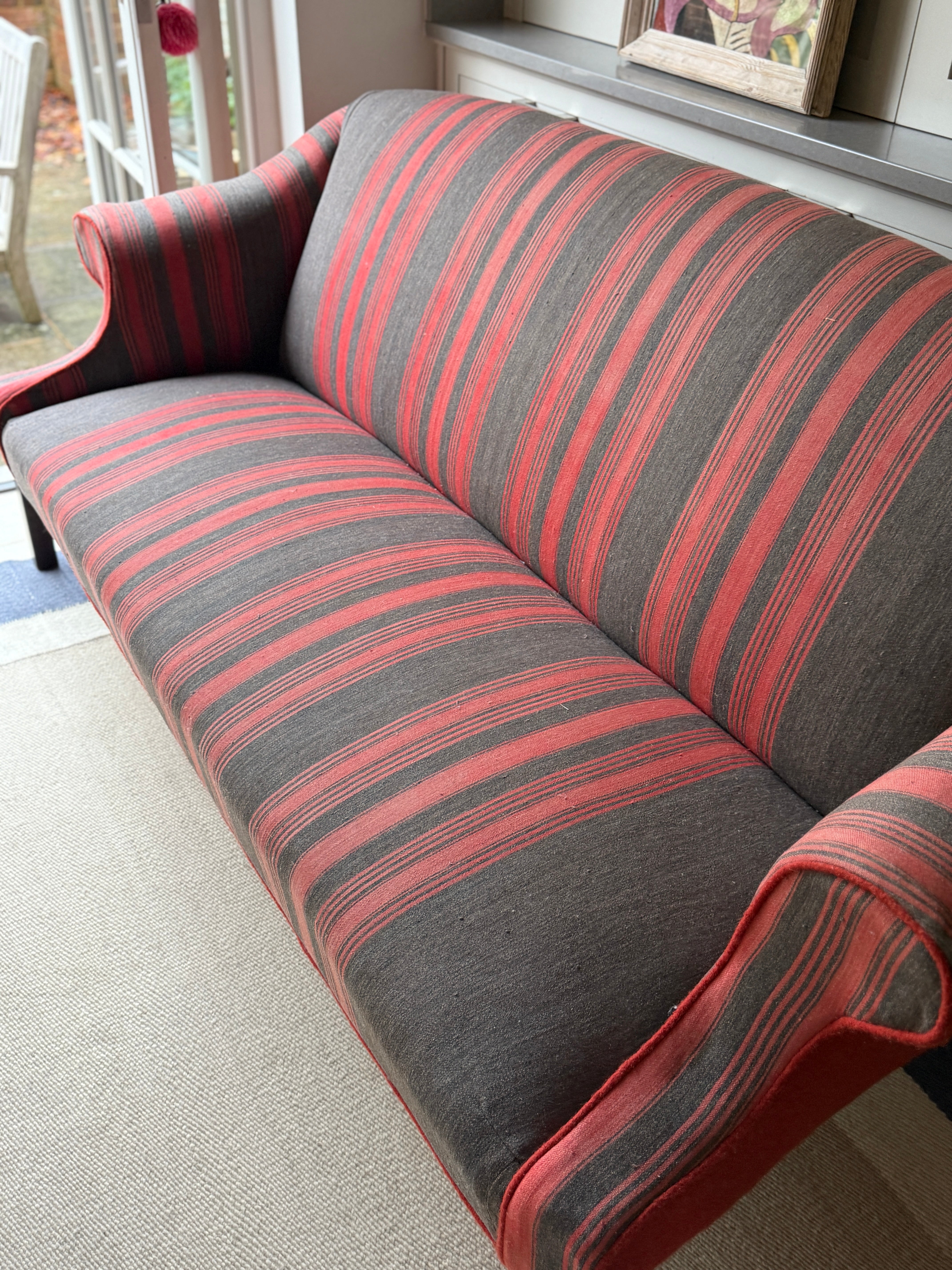 Large Antique English Sofa upholstered in an French Antique Textile