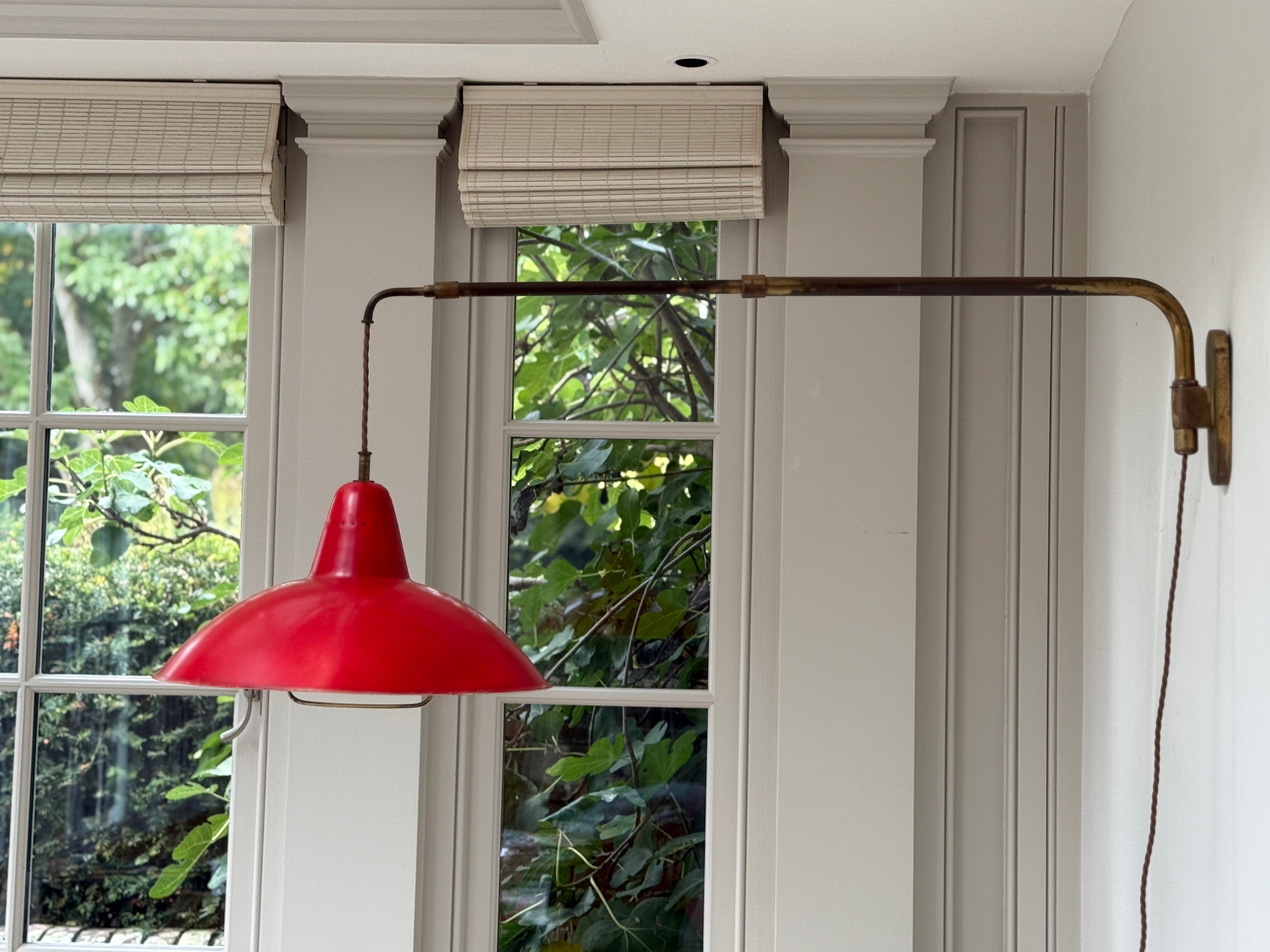Italian 50s Brass Extending Wall Light with Red Cone Shade.