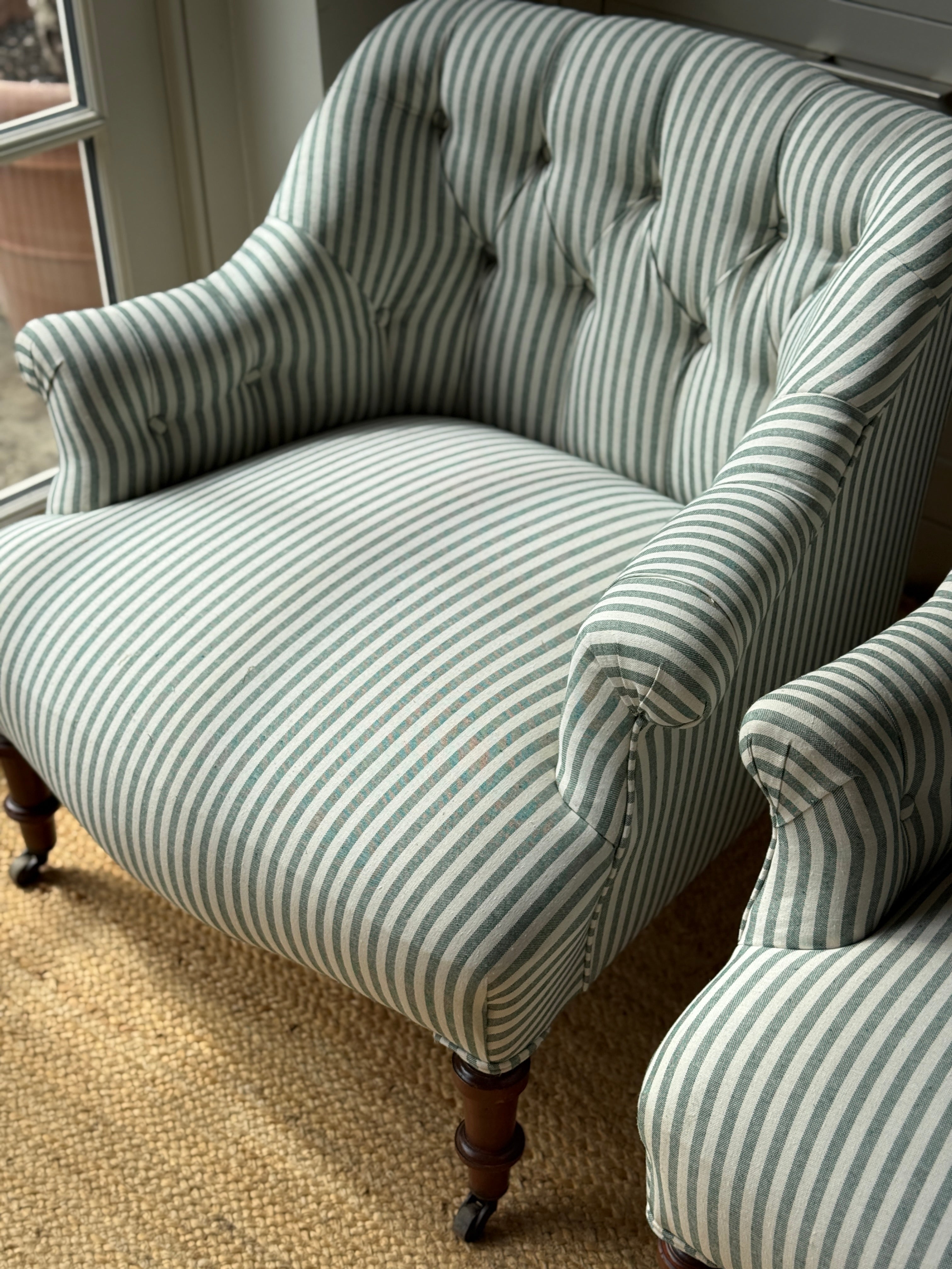 A Pair of French Napoleon III Button-Back Fauteuils