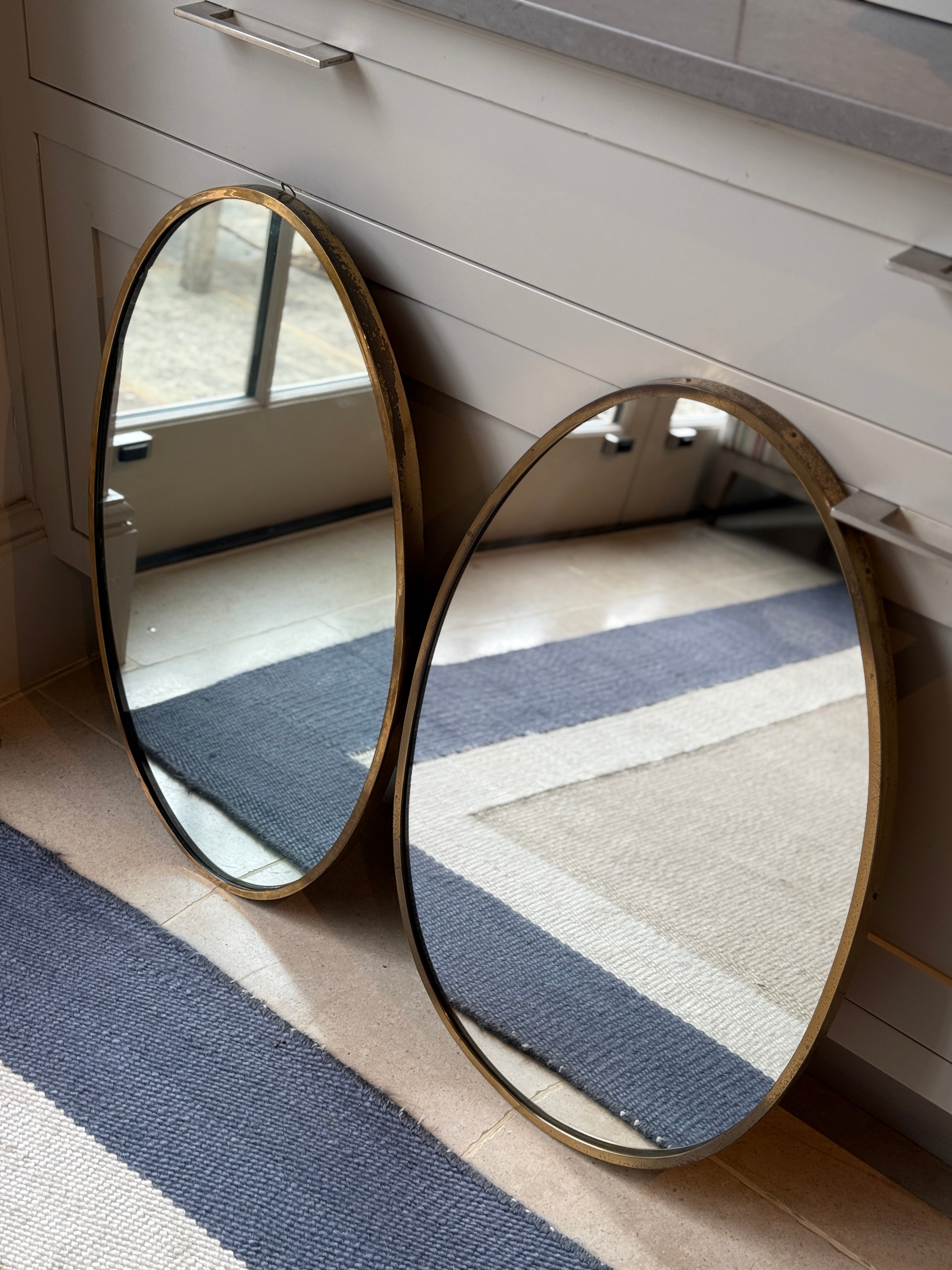 Near Matching Pair of Oval Italian Brass Mirror