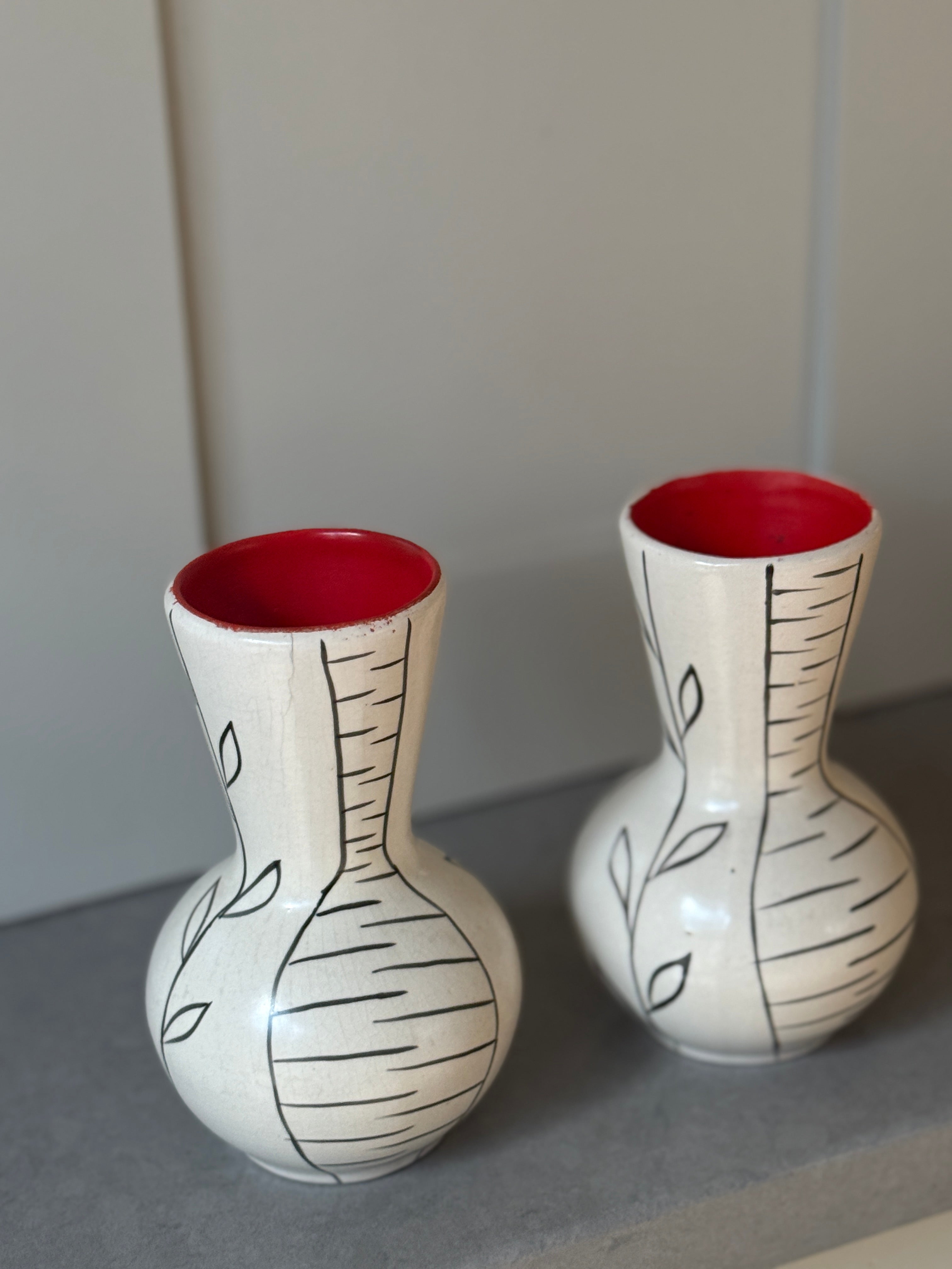 Pair of Small White Cerac Vases