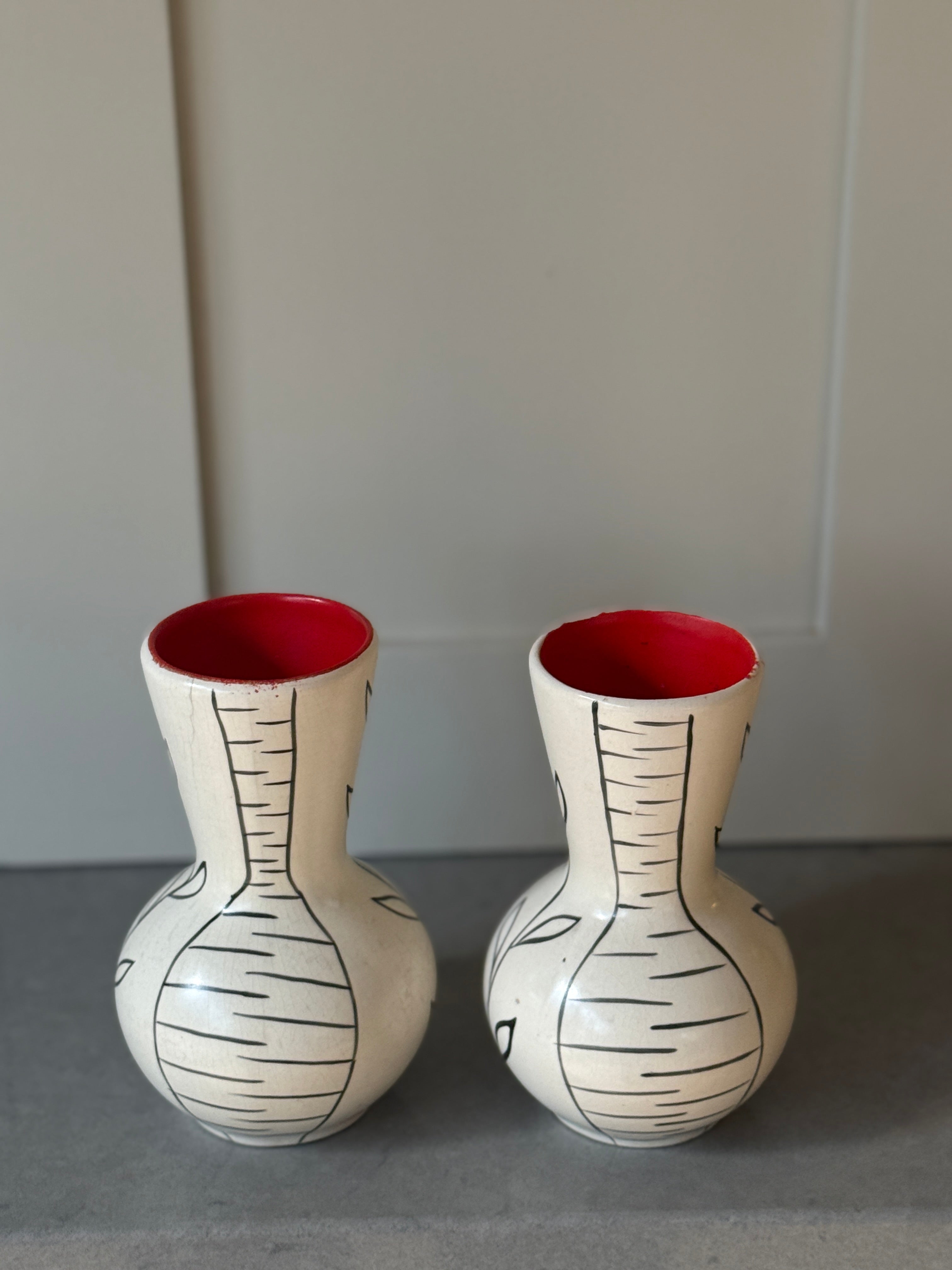 Pair of Small White Cerac Vases