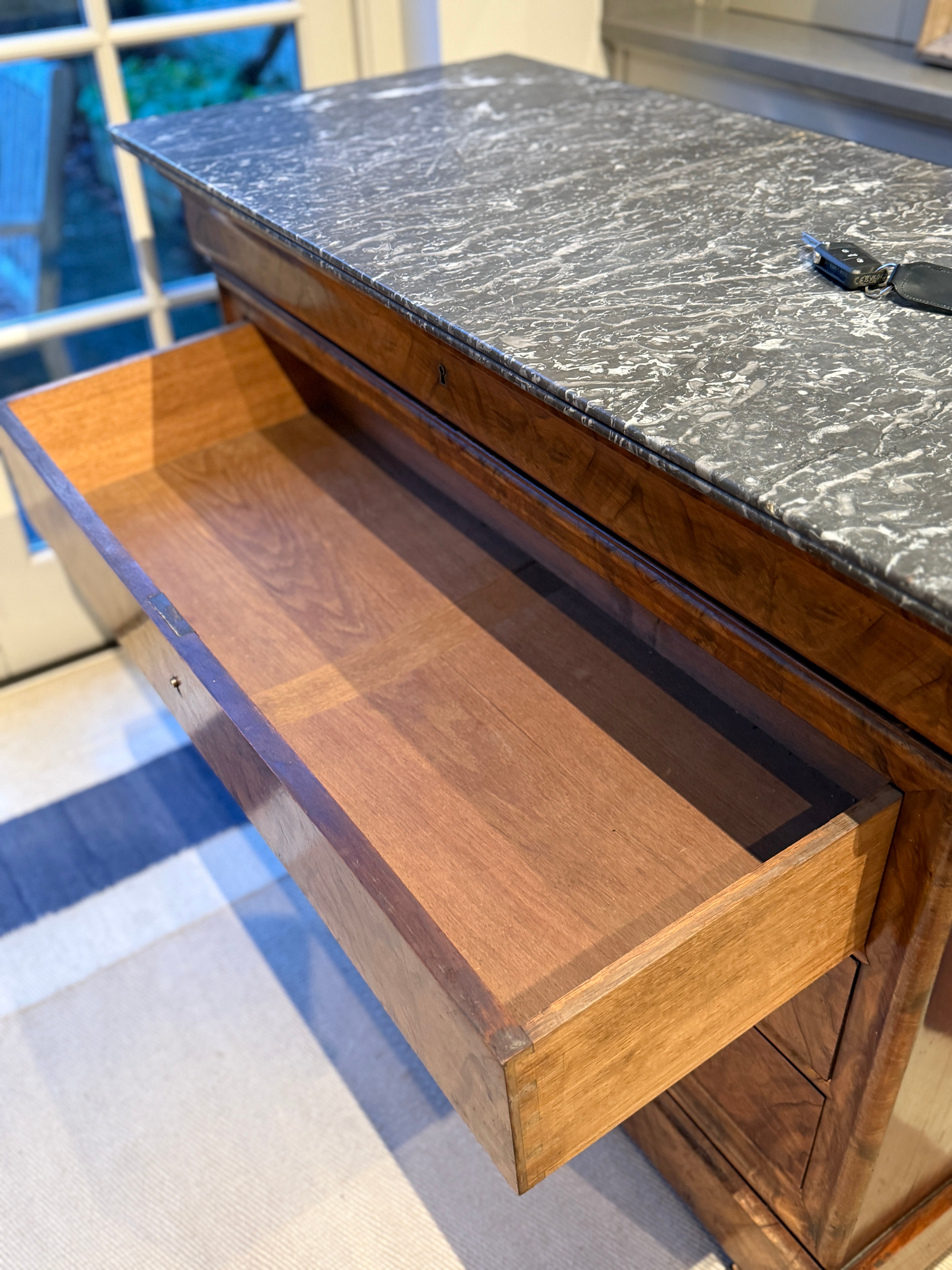 French Louis-Philippe walnut commode with grey marble top, circa 1835–1848