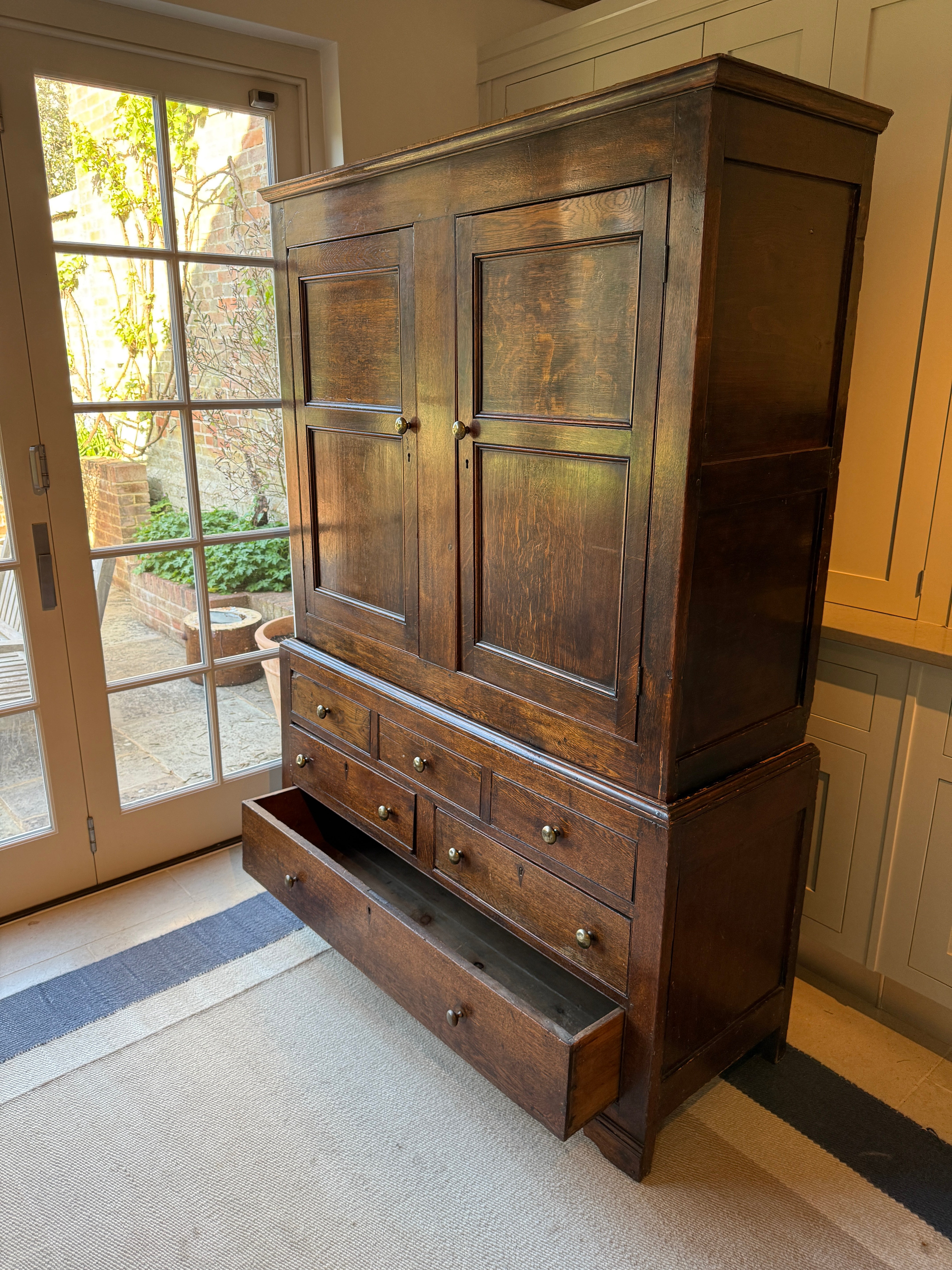 Early 19th Century English Oak Cupboard on Chest