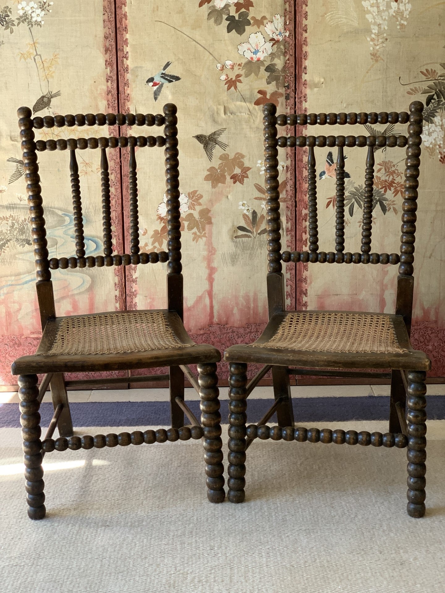 Pair of Bobbin and Cane Nursing Chairs