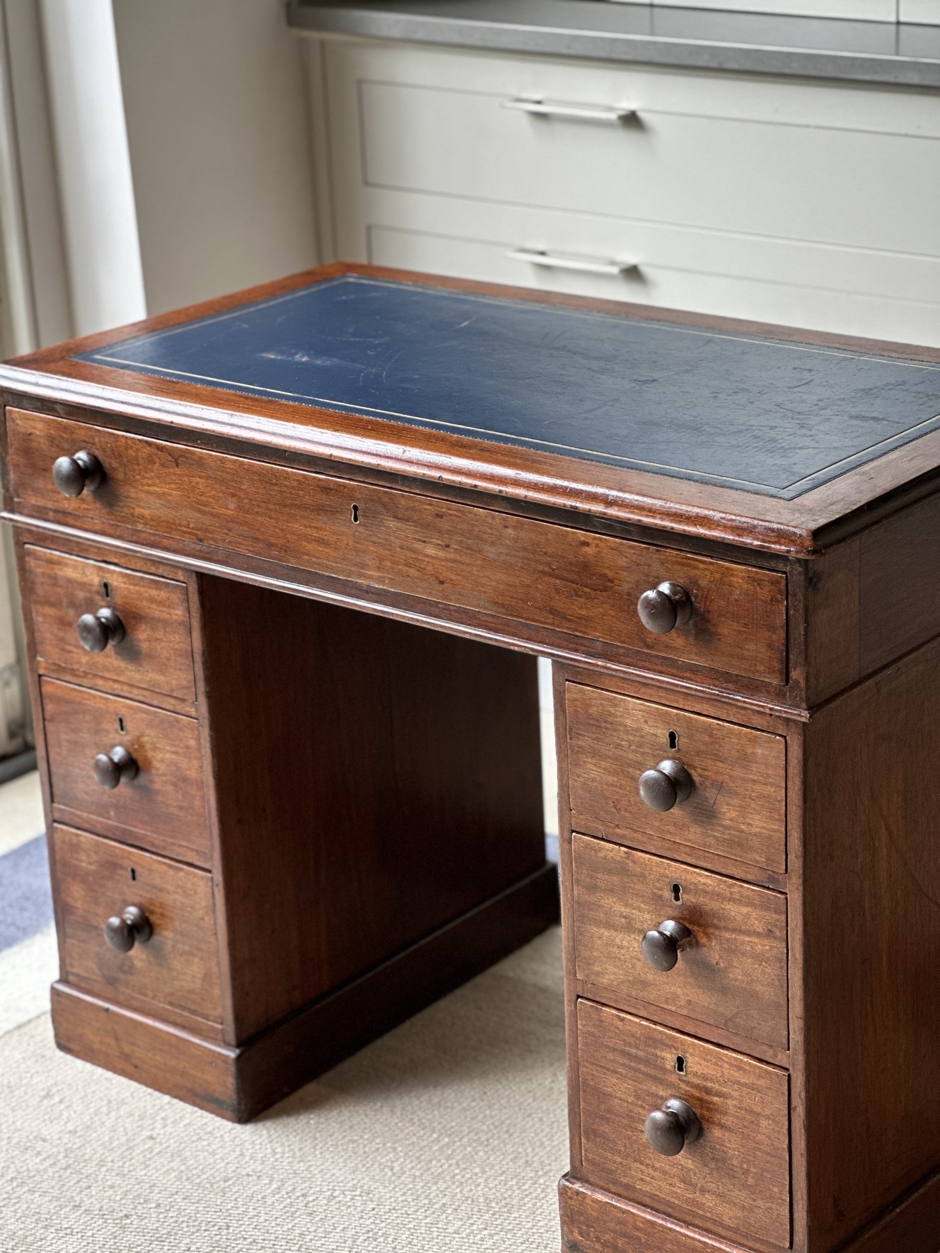 Small Kneehole Desk with more recent navy blue leather top
