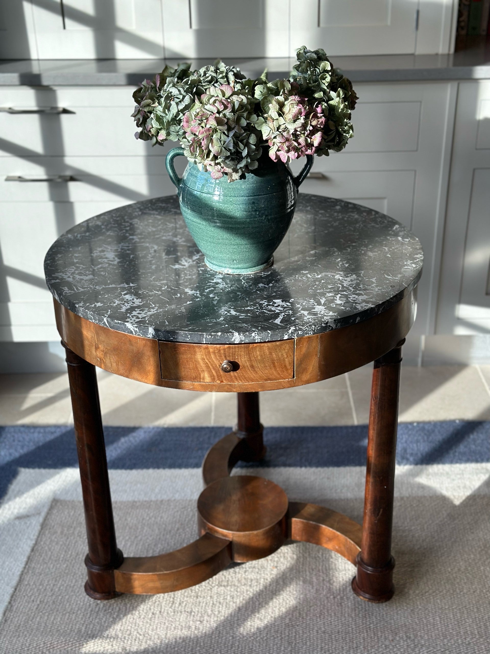 Small Gueridon with grey marble top and spinning legs