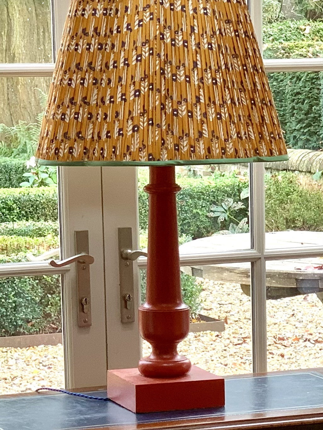 Large red wooden table lamp