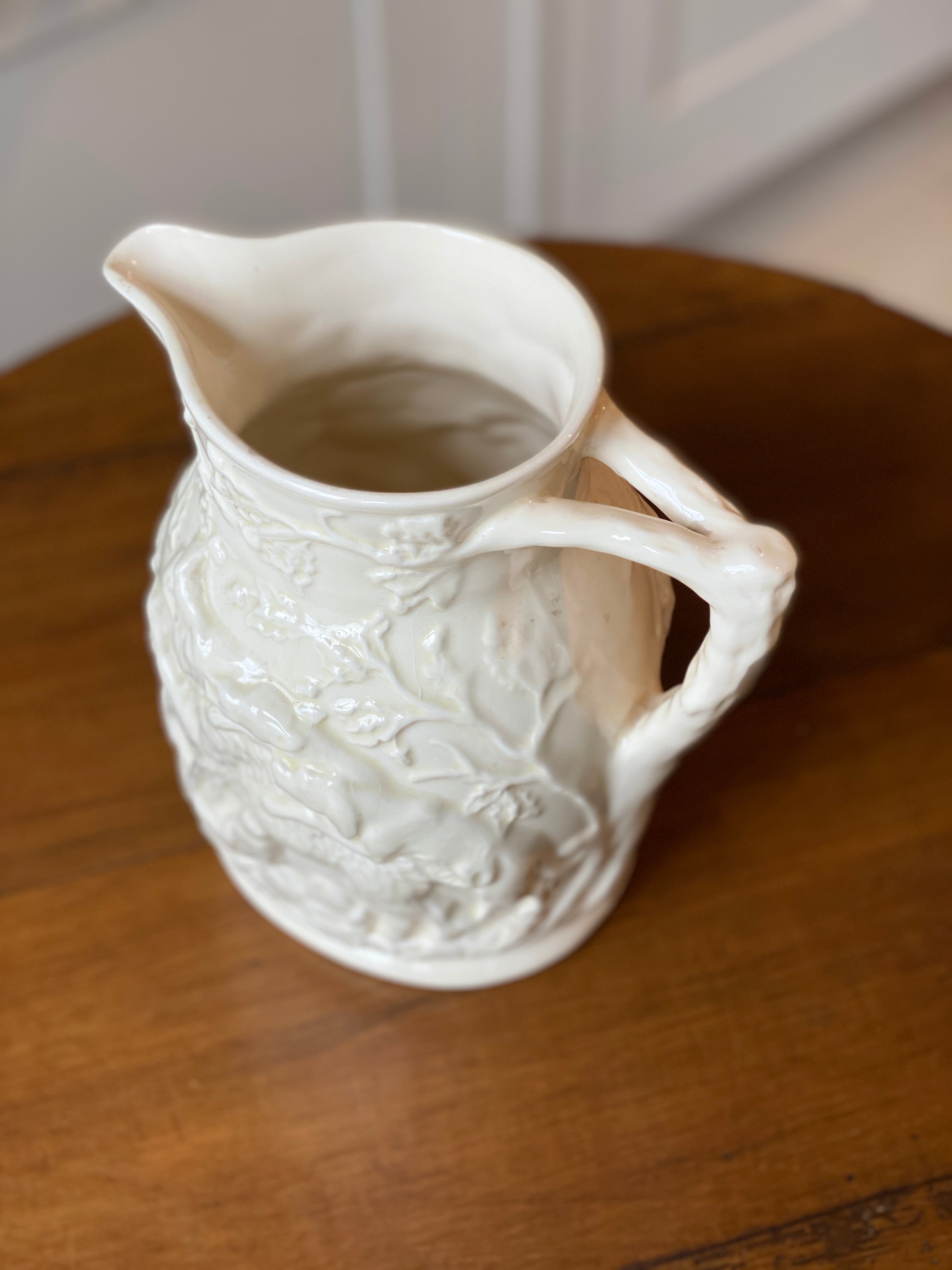 Ivory hunting scene jug by Masons