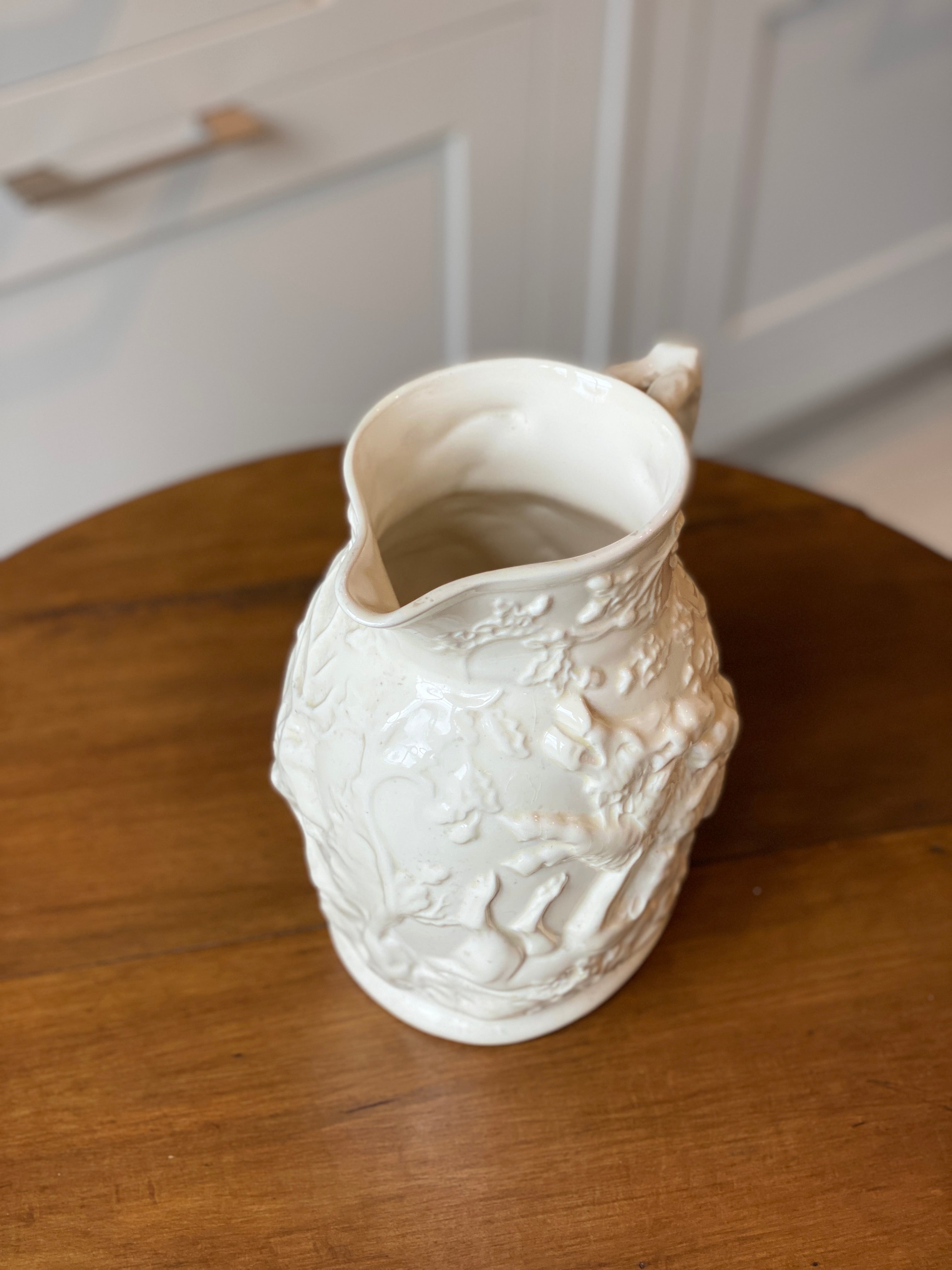 Ivory hunting scene jug by Masons