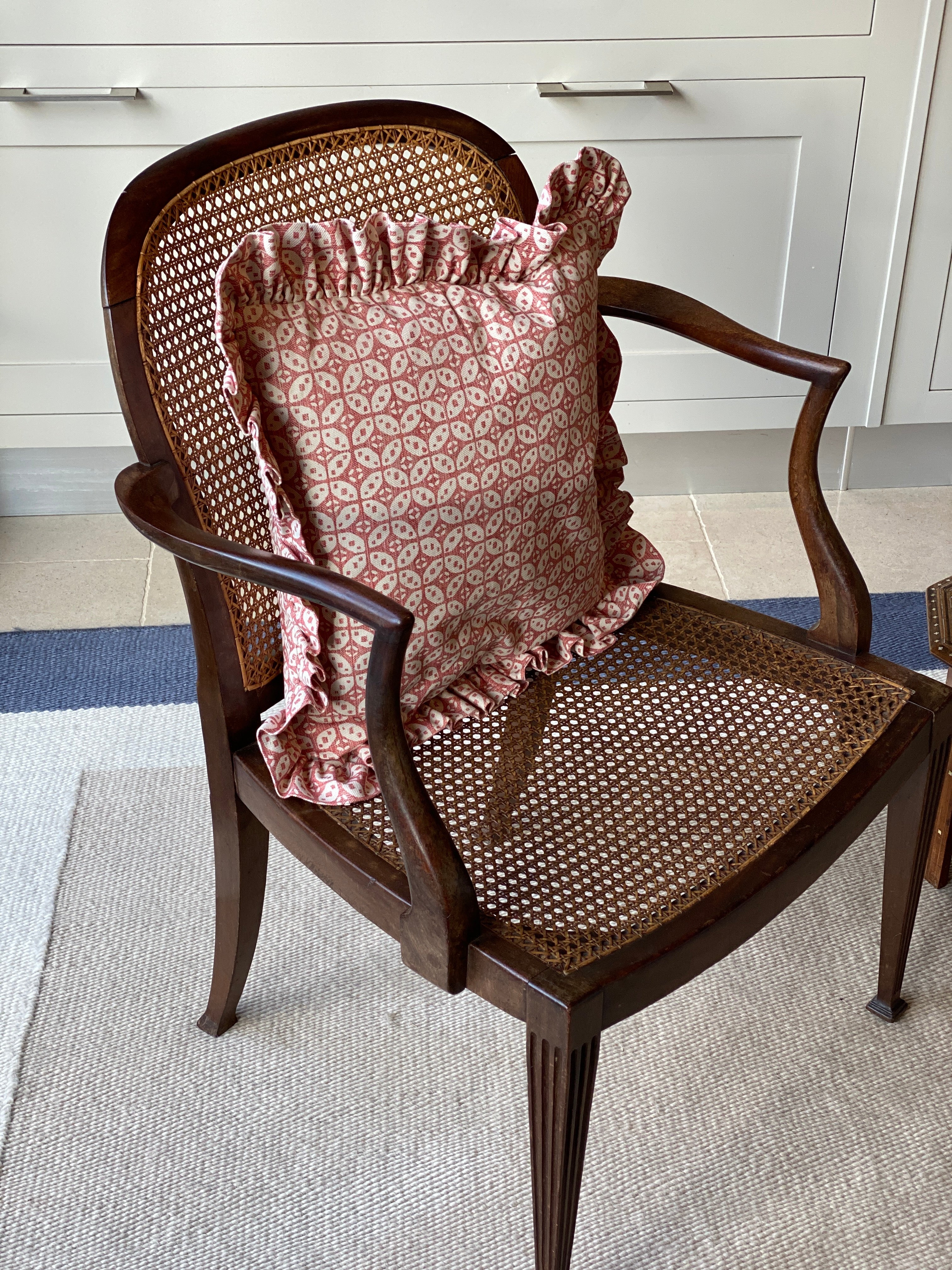 Large walnut and cane arm chair