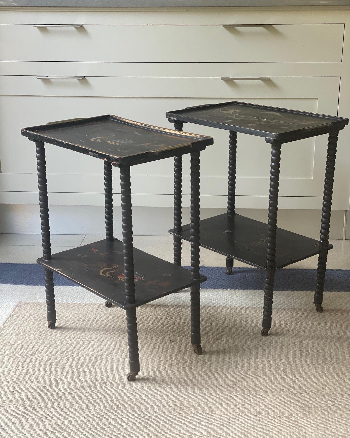 Pair of Black Painted Bobbin Trolleys
