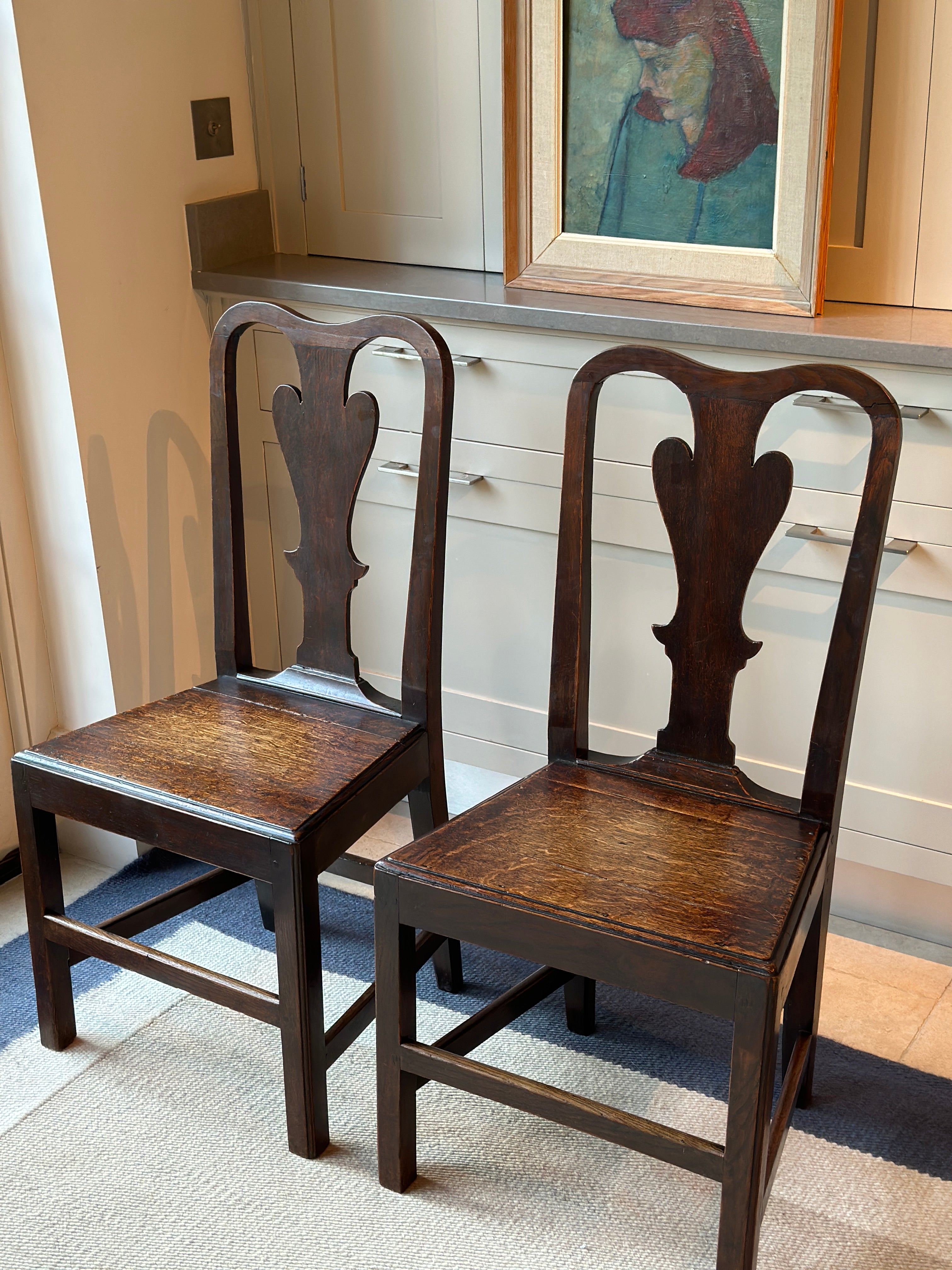 Pair of Early 19th C Oak Chairs with Charming Backs