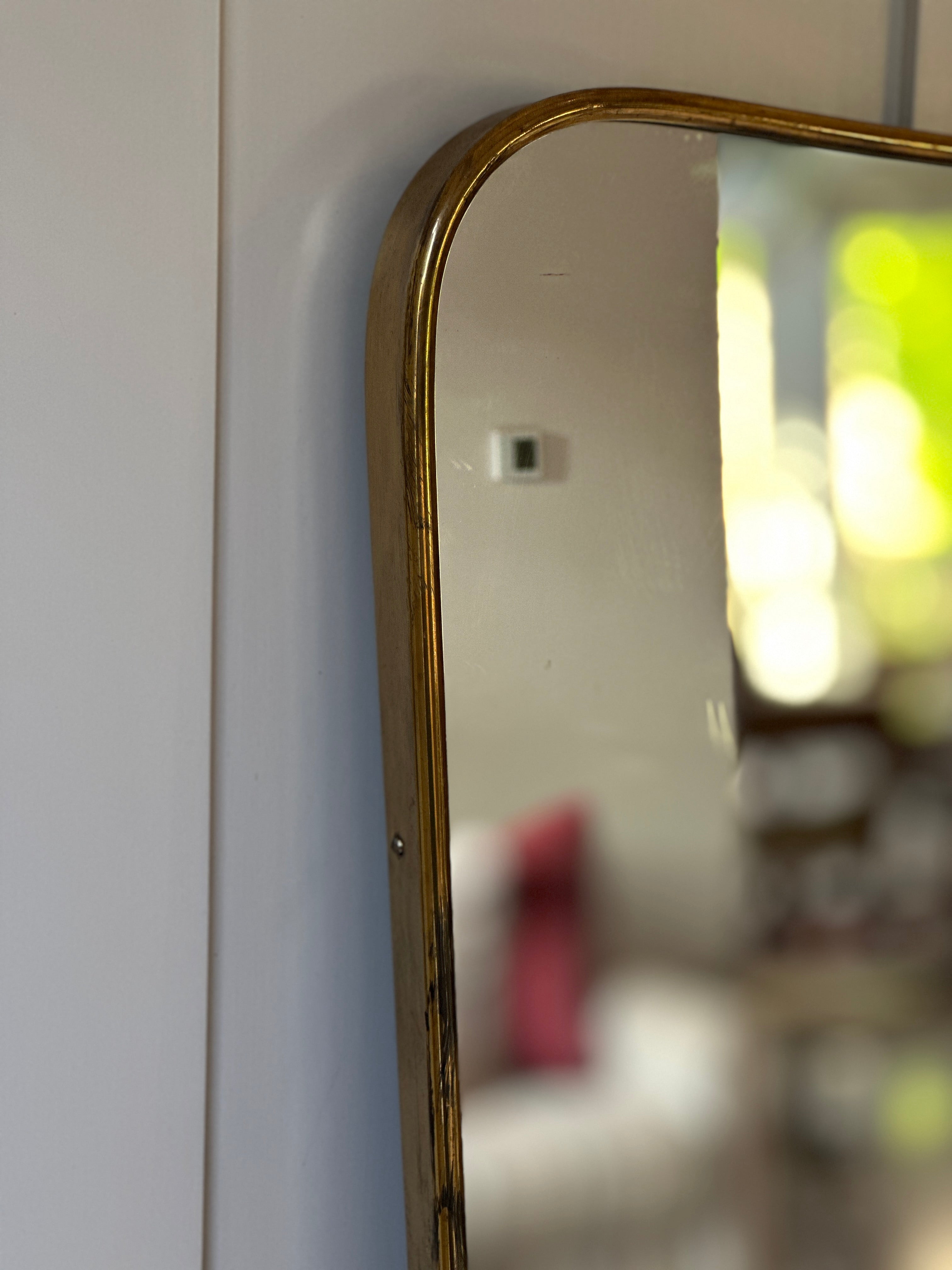 Mid-Century Brass Shield Mirror (62.5 by 46.5)