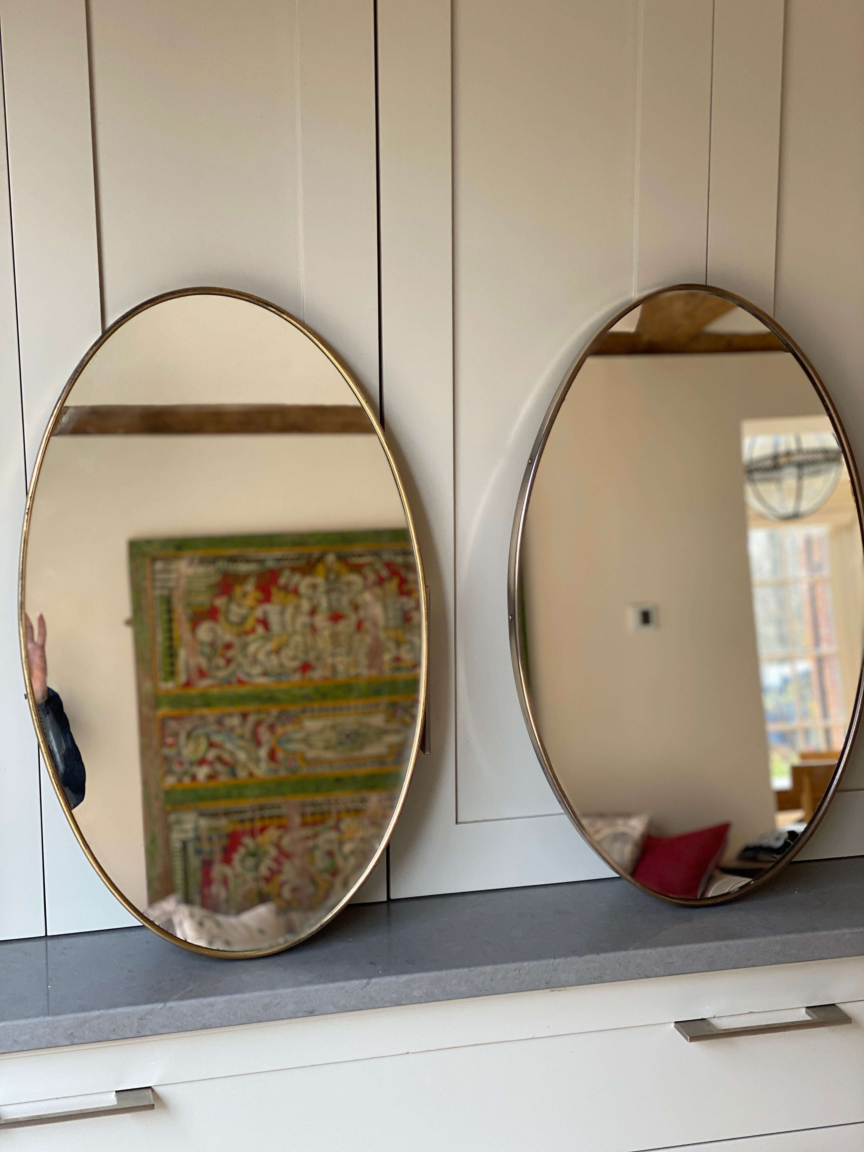 Lovely Mid-Century Pair of Oval Brass Mirrors