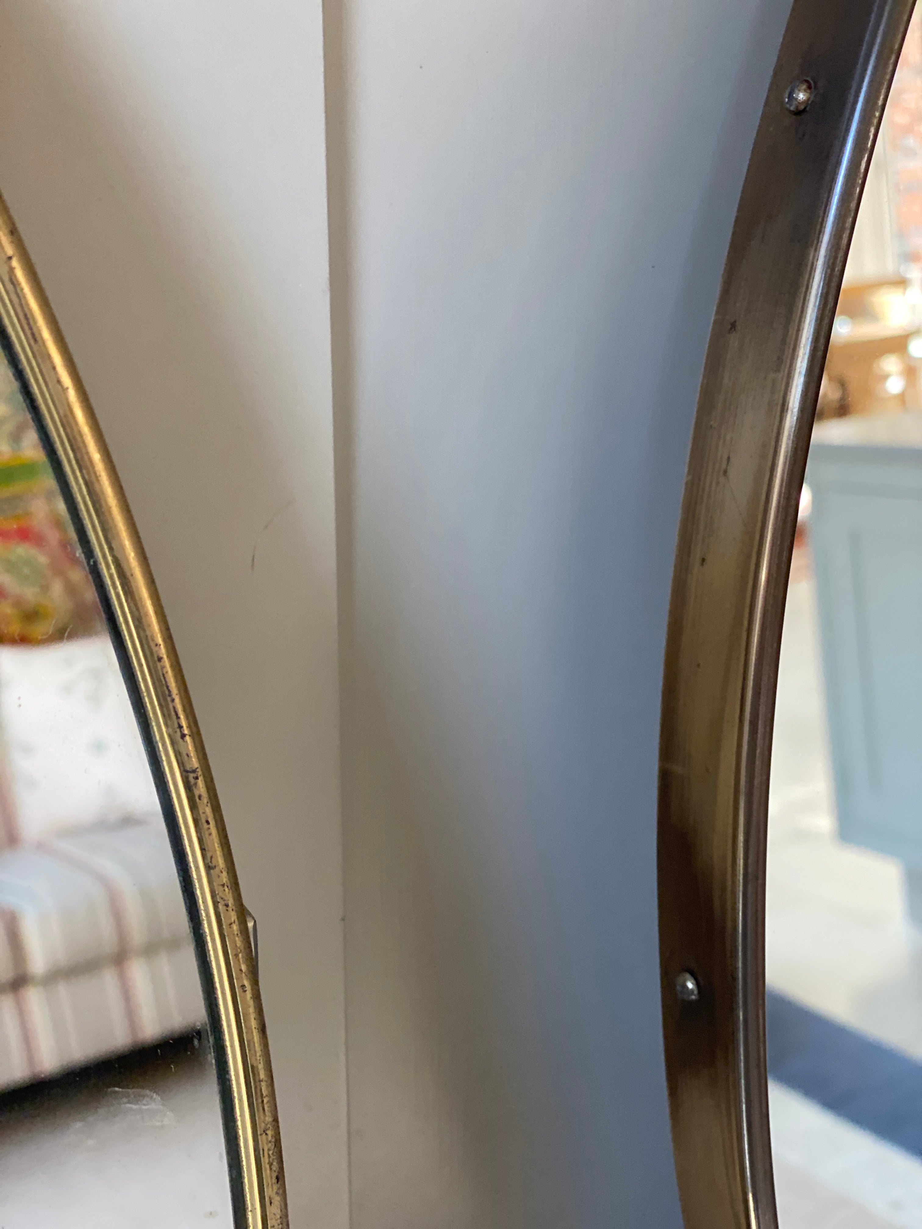 Lovely Mid-Century Pair of Oval Brass Mirrors