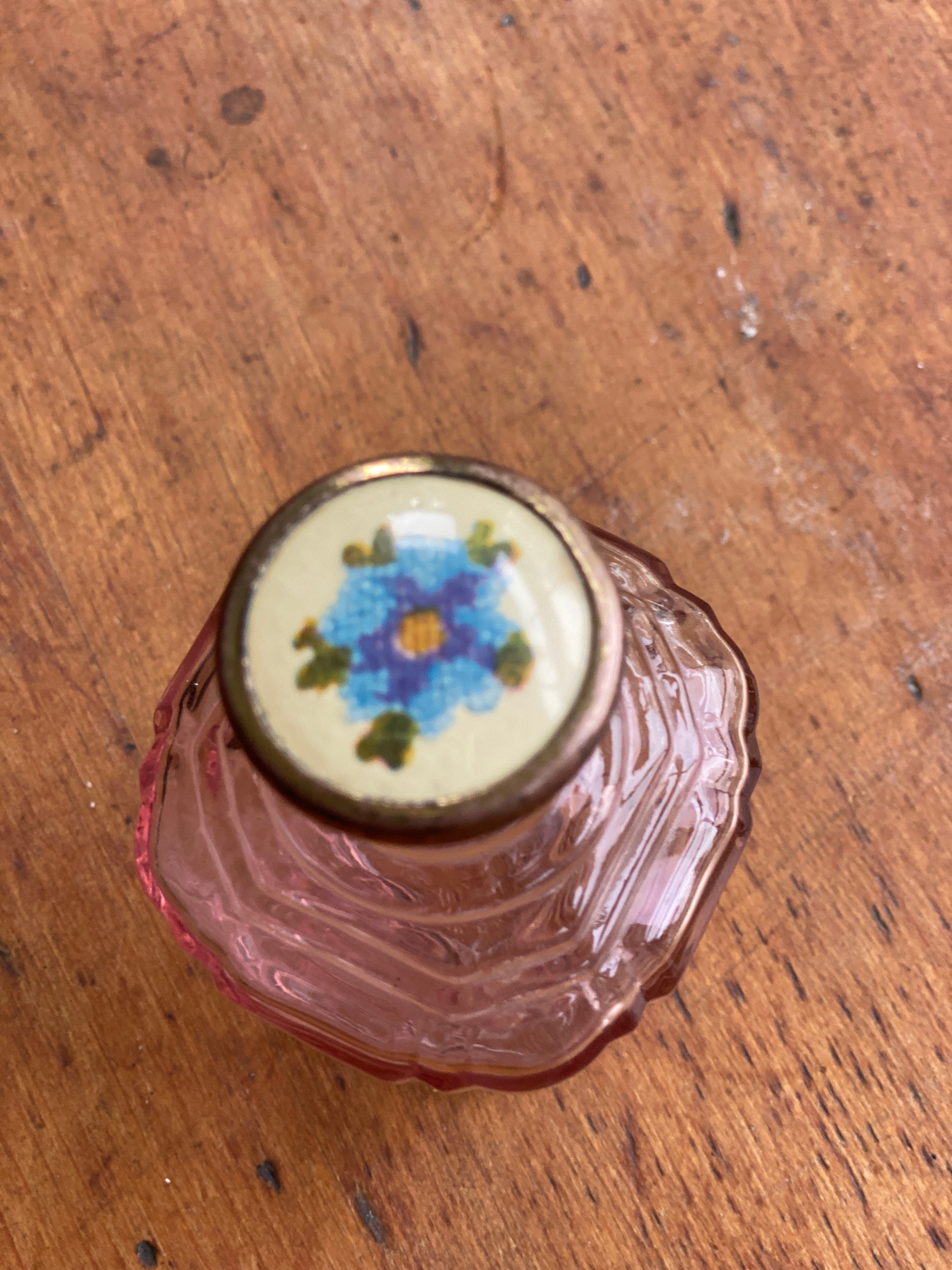 Really pretty pink perfume bottle with enamel top