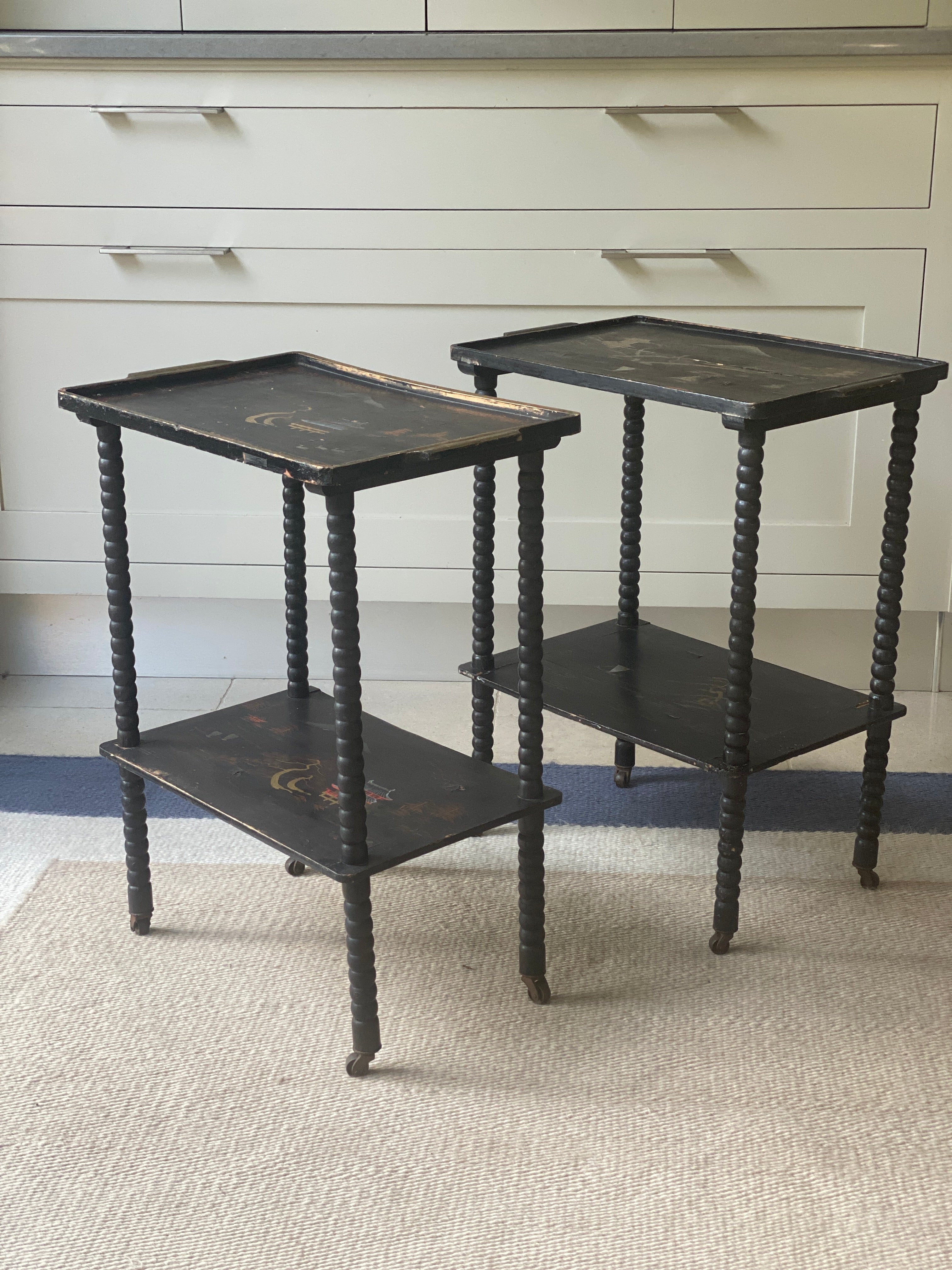 Pair of Black Painted Bobbin Trolleys