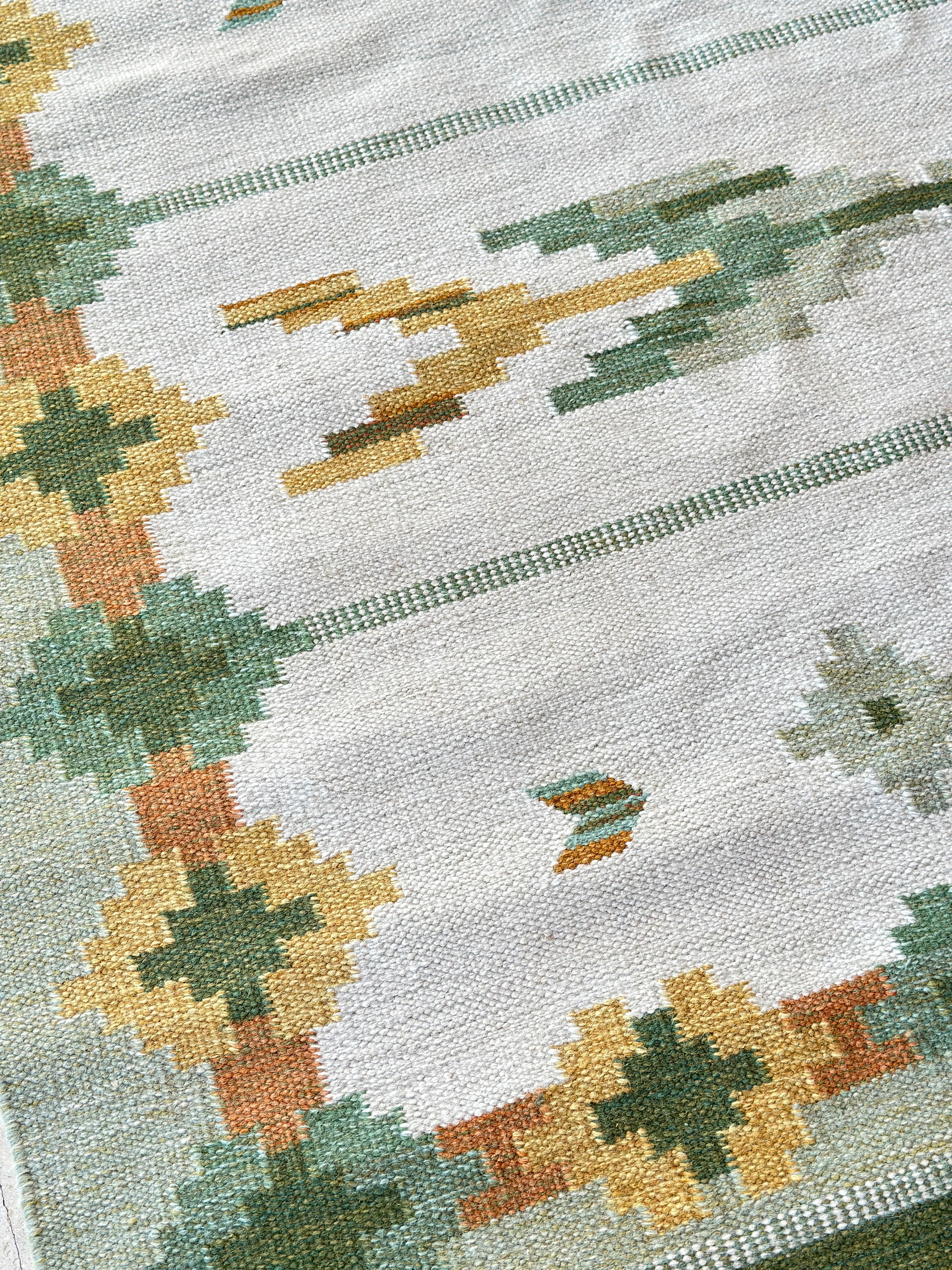 Vintage Swedish Flat Weave rug with green tones.