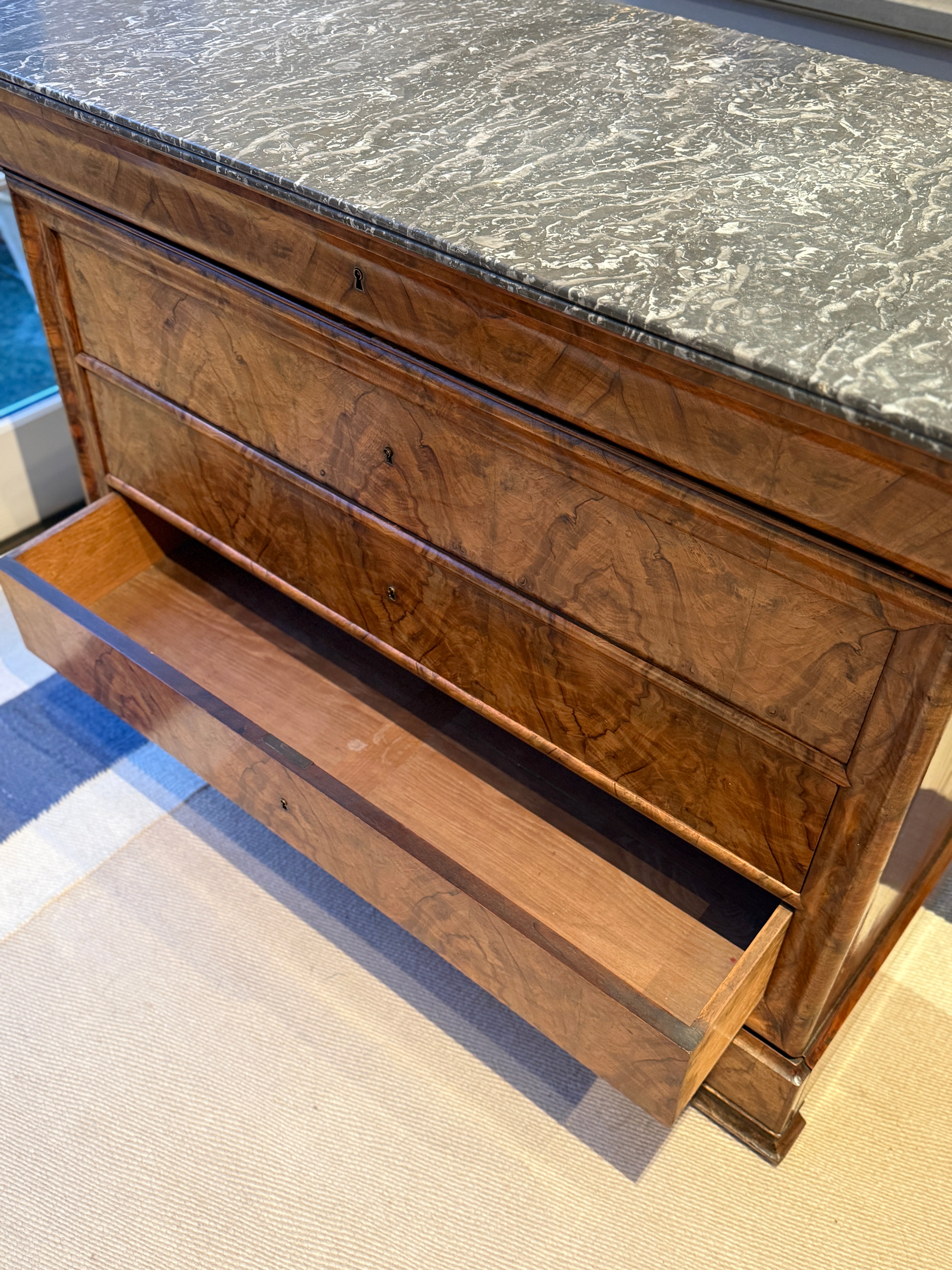 French Louis-Philippe walnut commode with grey marble top, circa 1835–1848