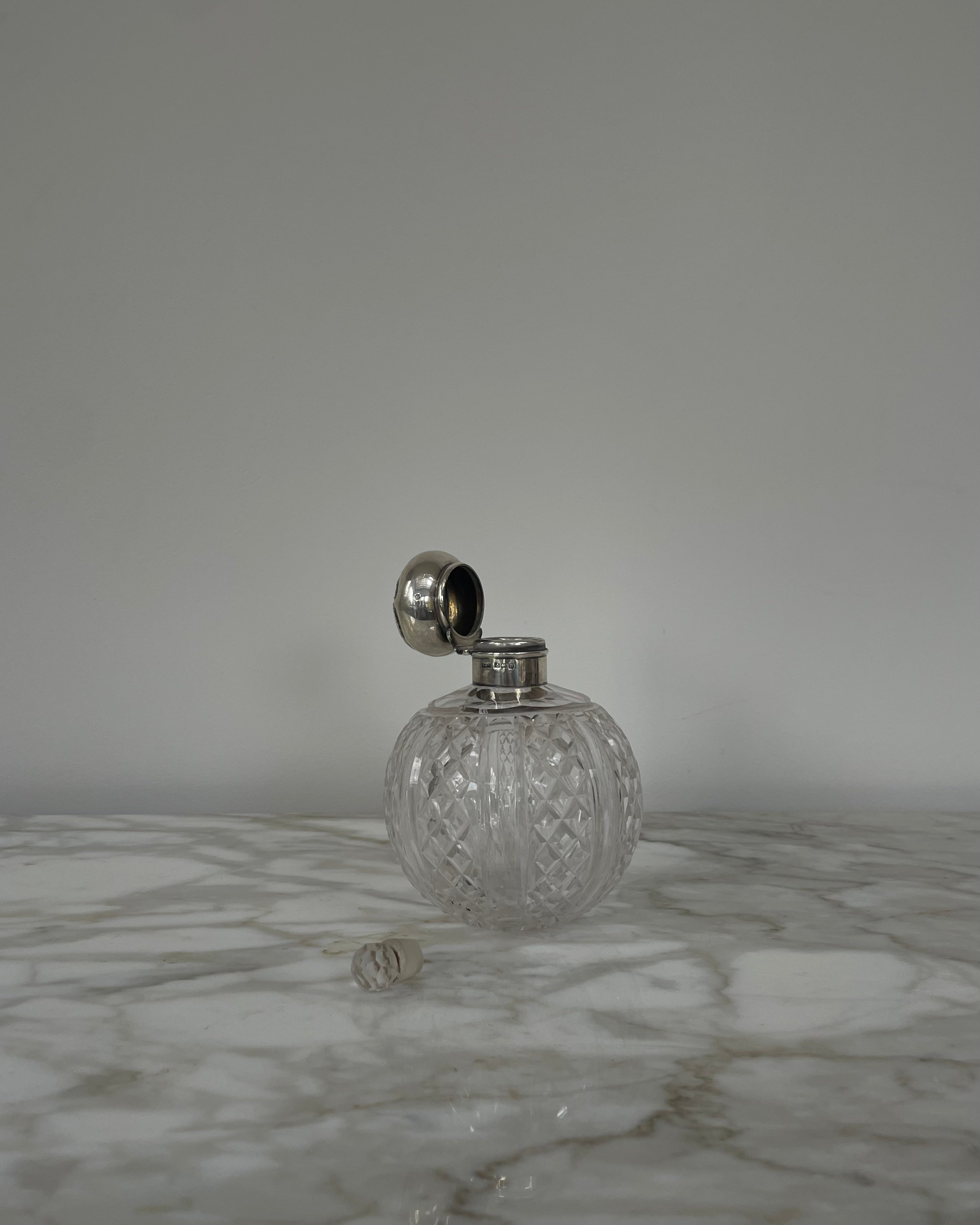 Cut Glass Decanter with Silver Top