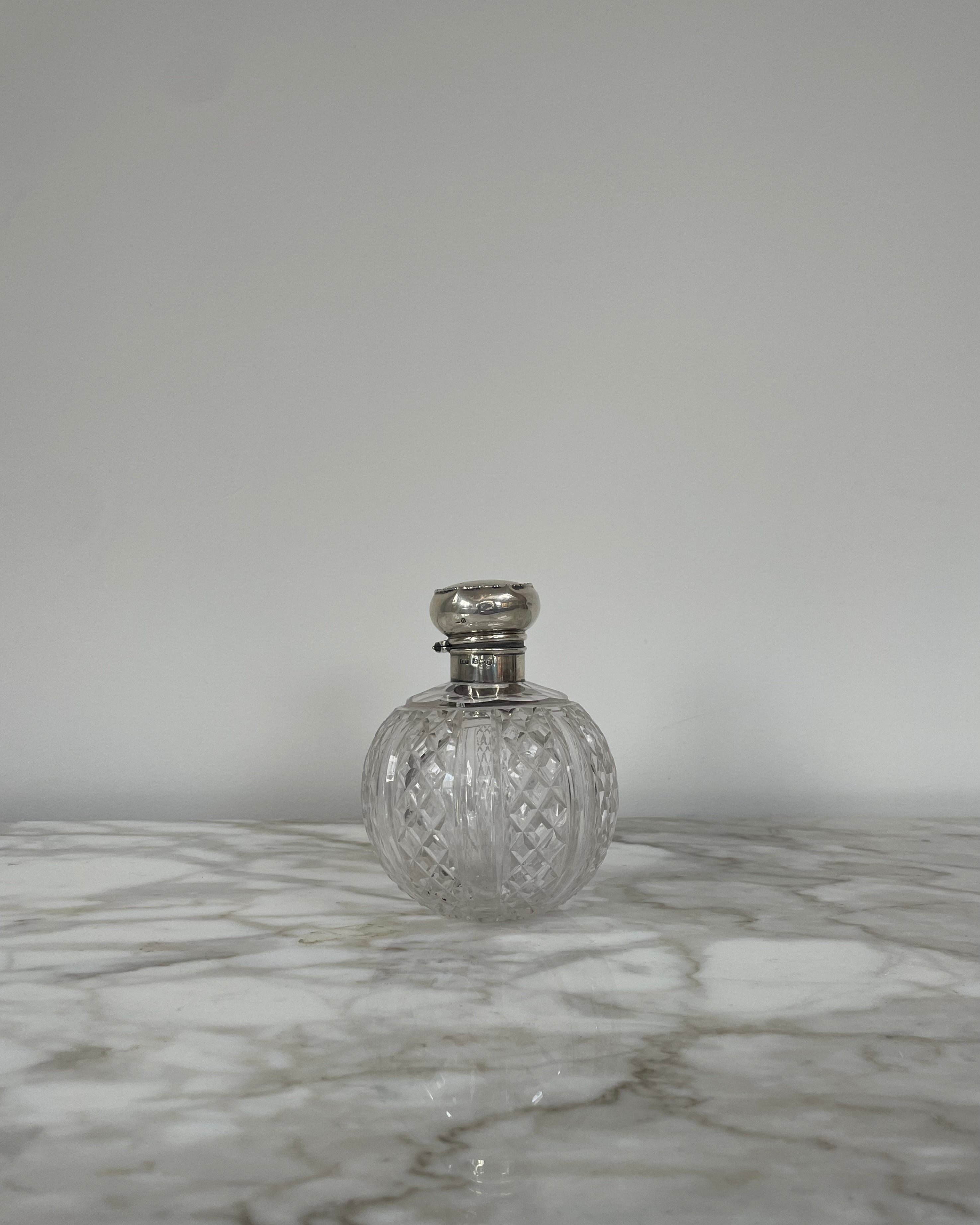 Cut Glass Decanter with Silver Top