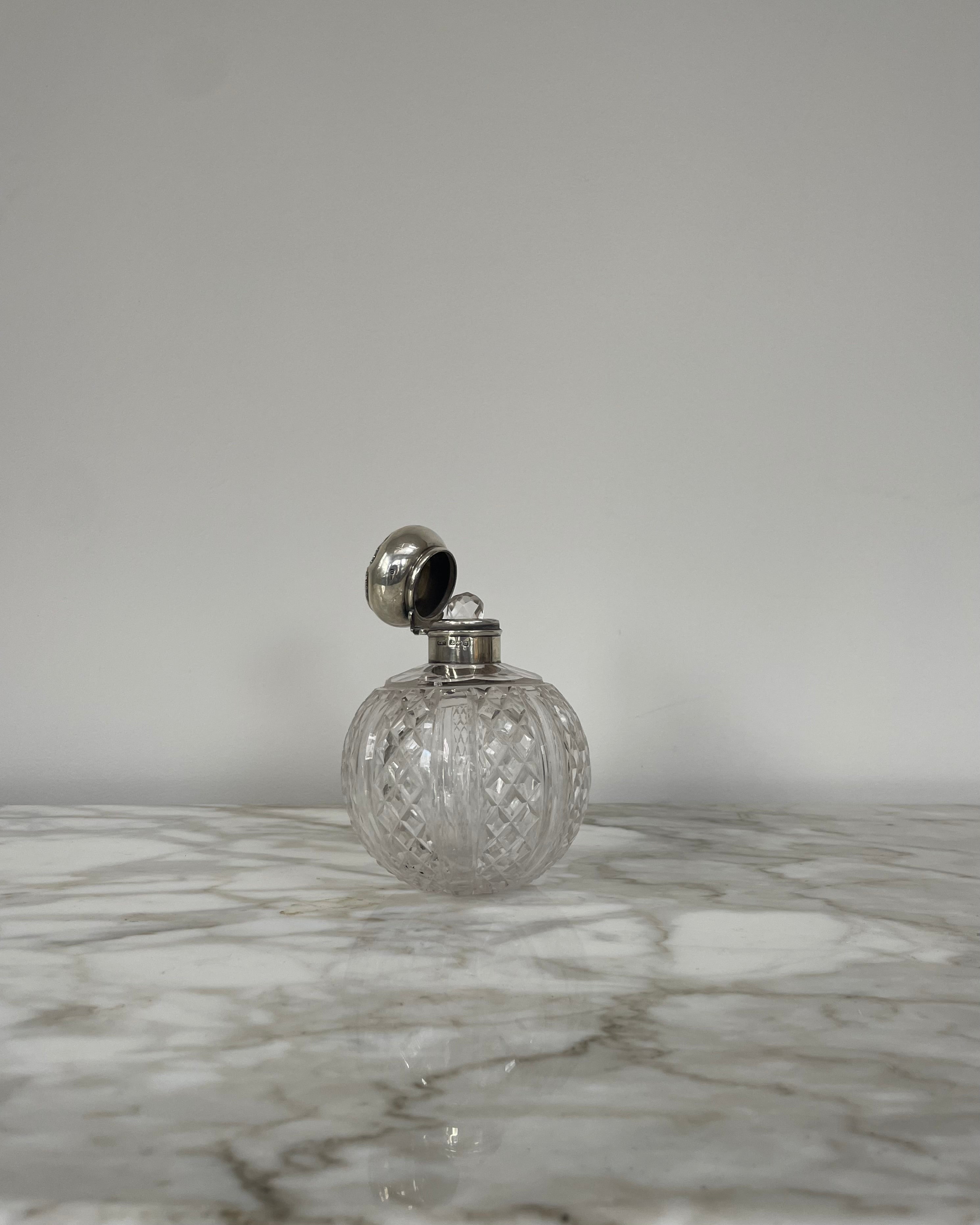 Cut Glass Decanter with Silver Top