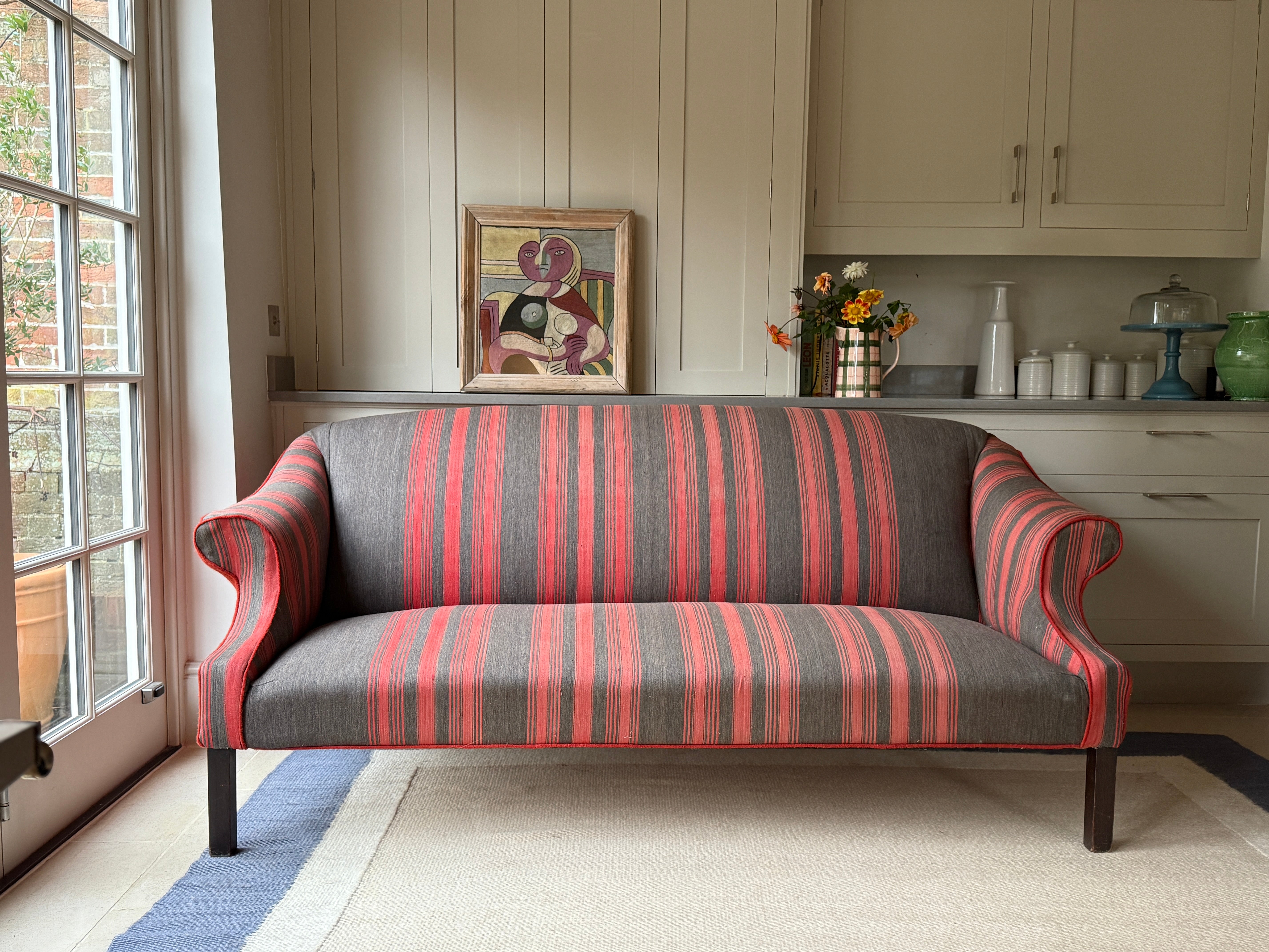 Large Antique English Sofa upholstered in an French Antique Textile