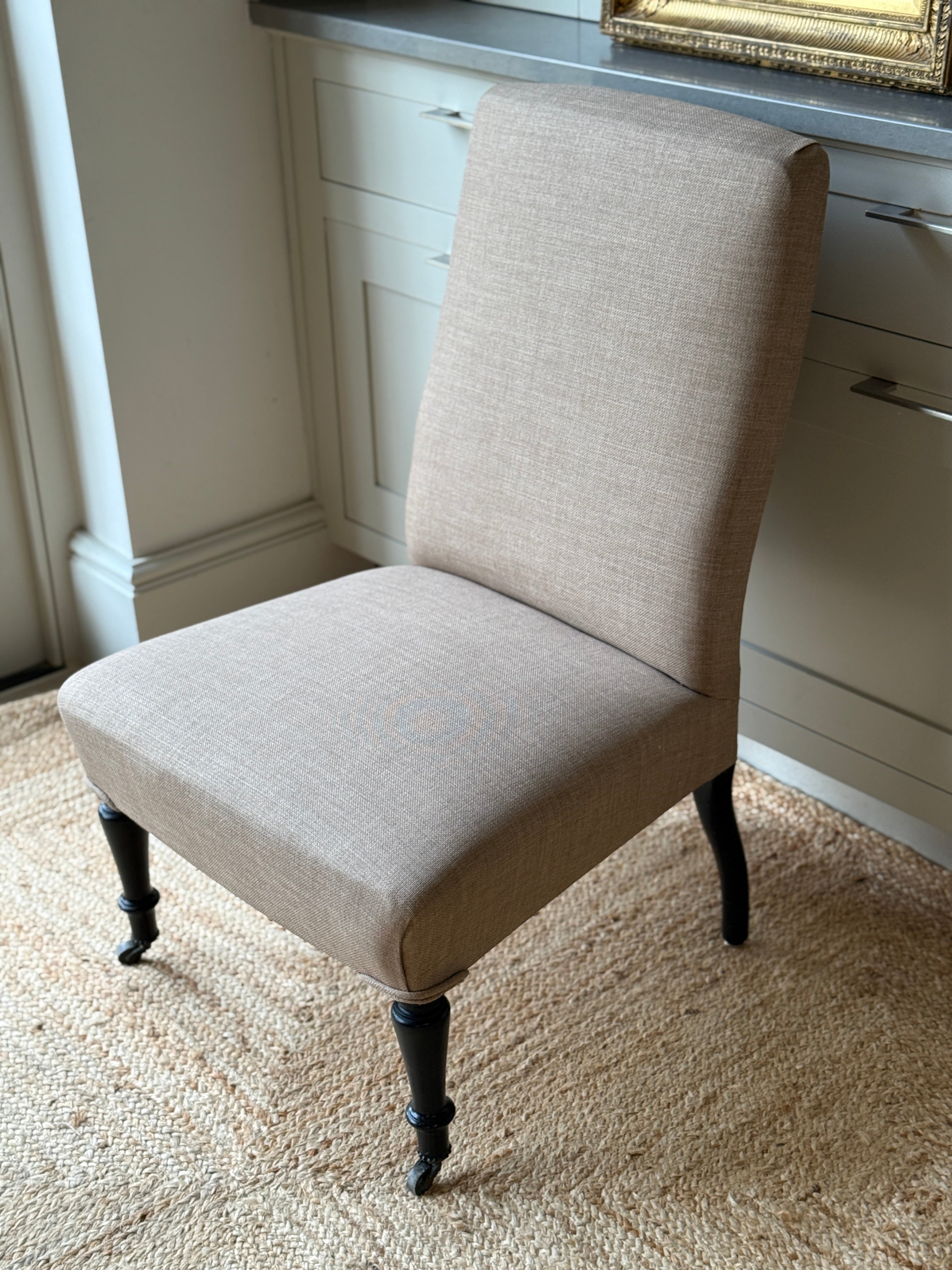 Late 19th Century Slipper Chair in heavy beige linen.