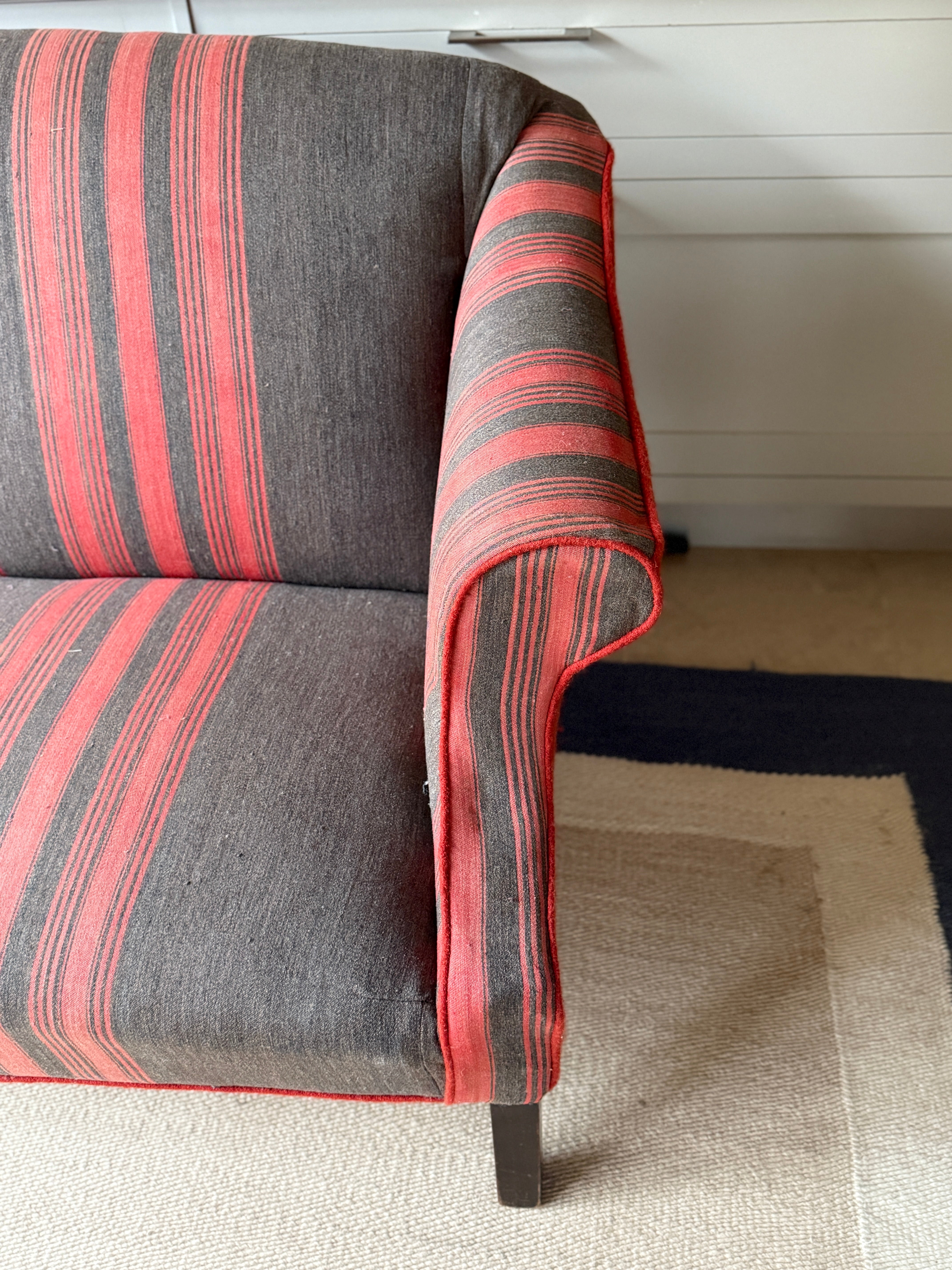 Large Antique English Sofa upholstered in an French Antique Textile