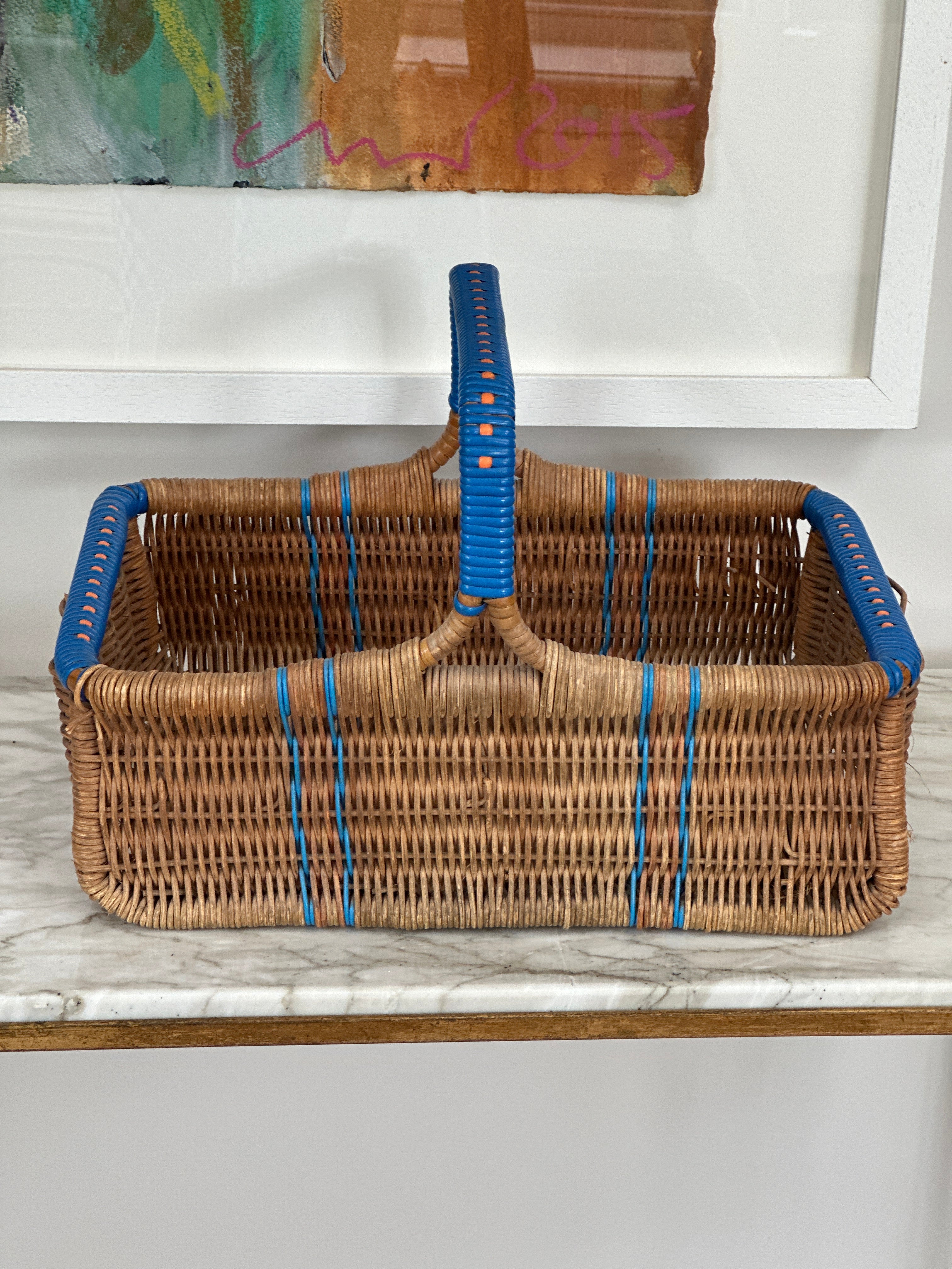 Vintage basket with blue accents & handle