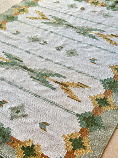 Vintage Swedish Flat Weave rug with green tones.