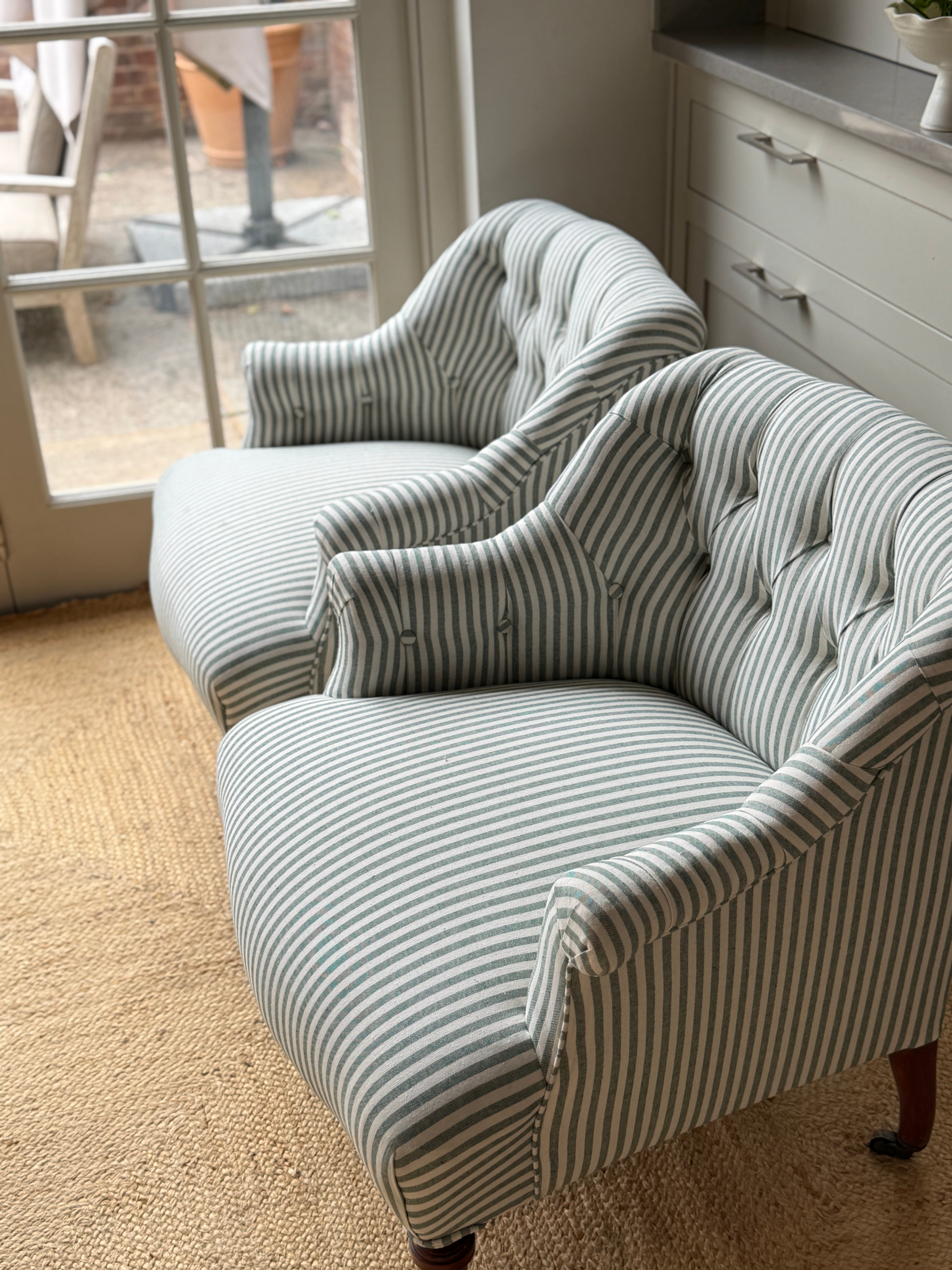 A Pair of French Napoleon III Button-Back Fauteuils