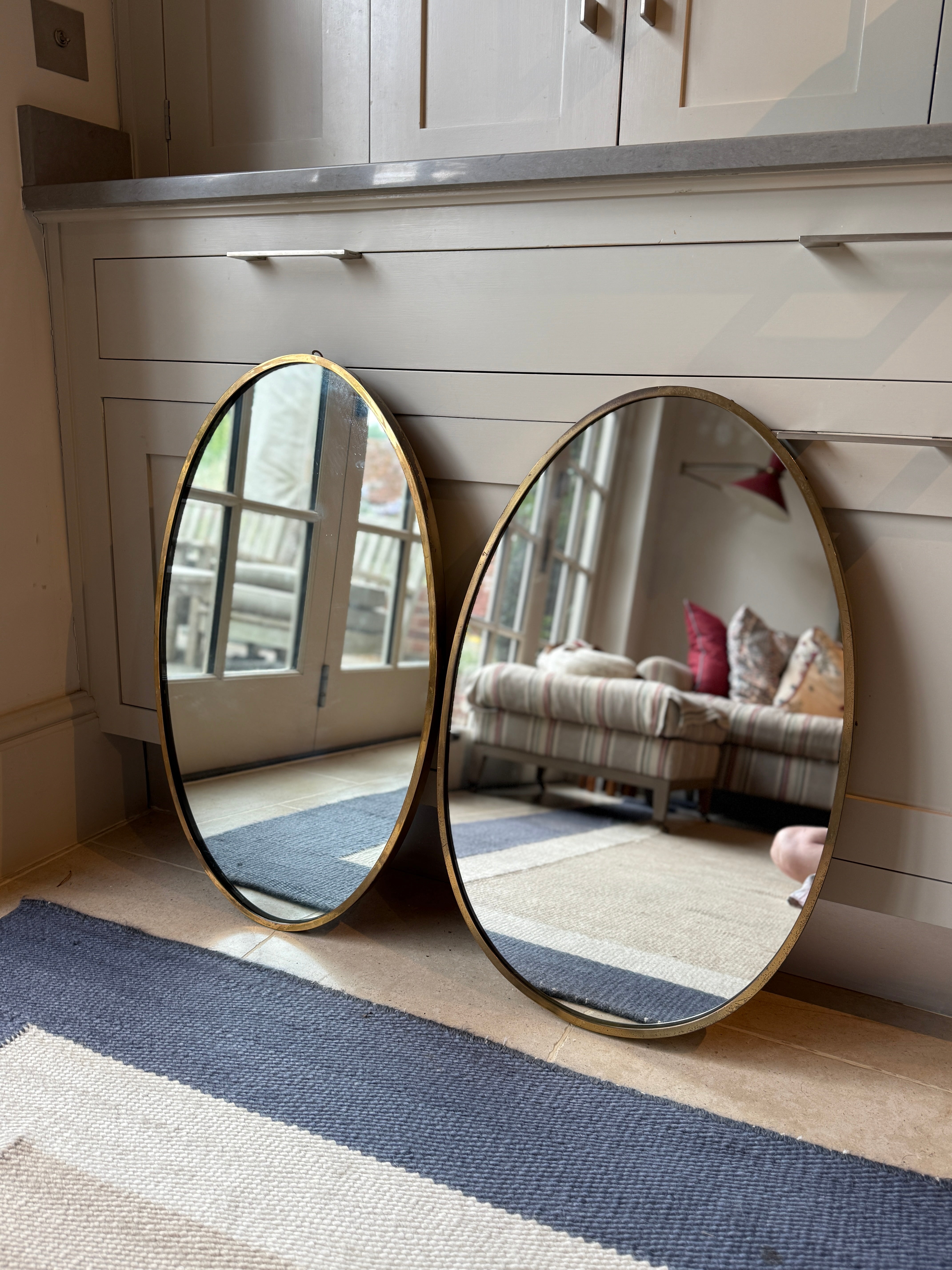 Near Matching Pair of Oval Italian Brass Mirror