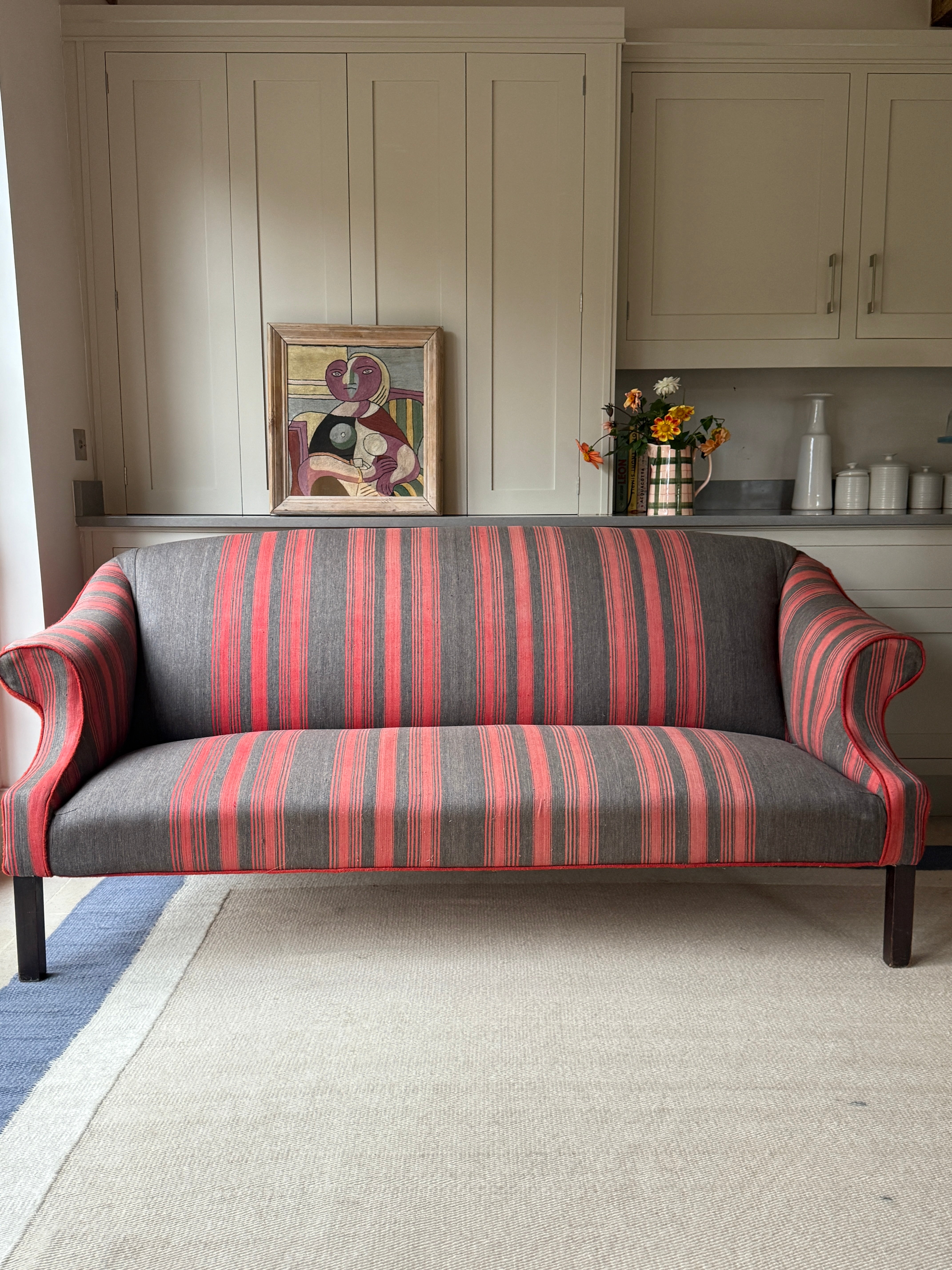 Large Antique English Sofa upholstered in an French Antique Textile