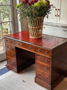 Amazing 19th Century Mahogany Desk with well worn Red Leather Top
