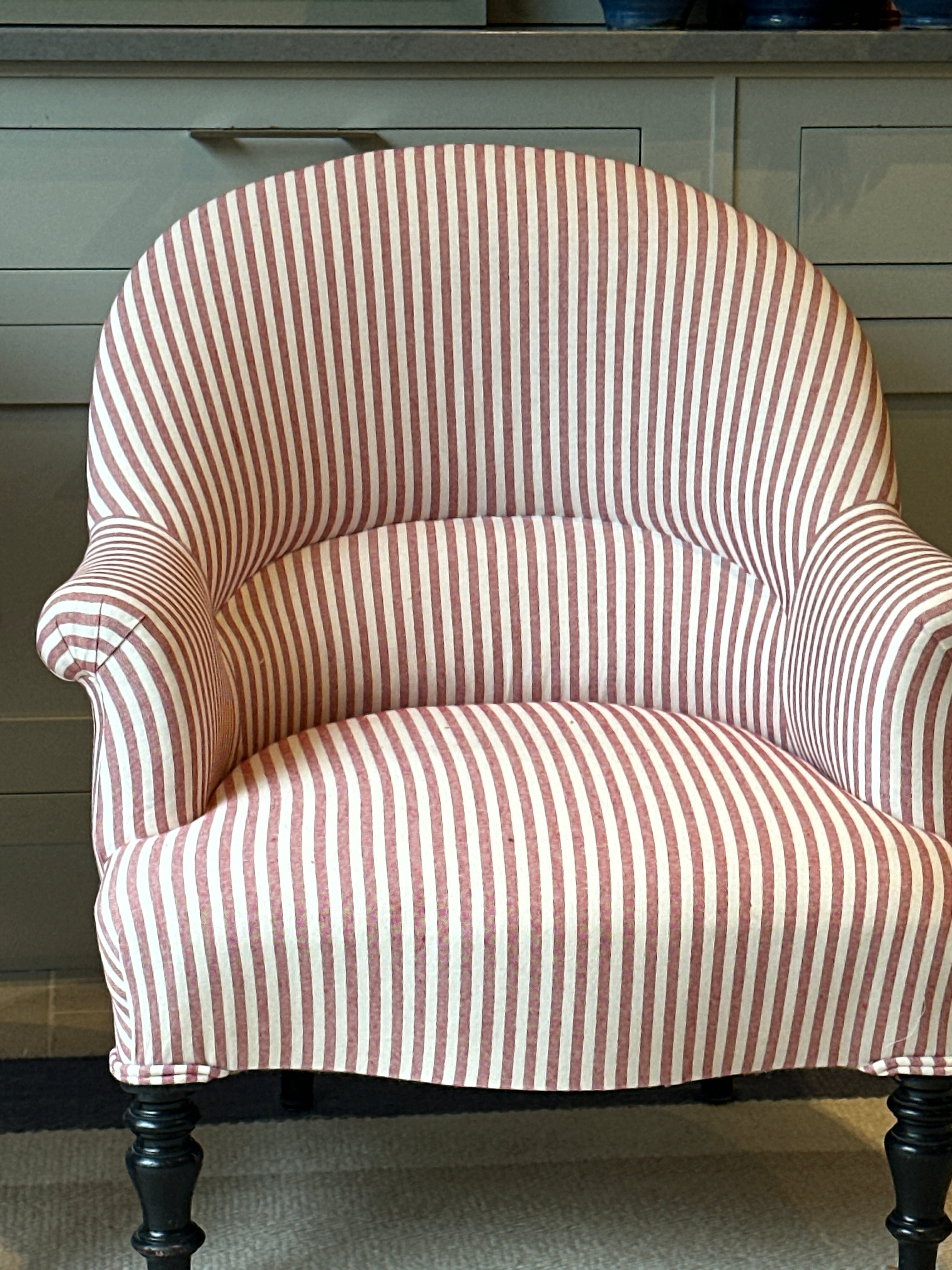 Pair of French Crapaud Tub chairs in red and white ticking