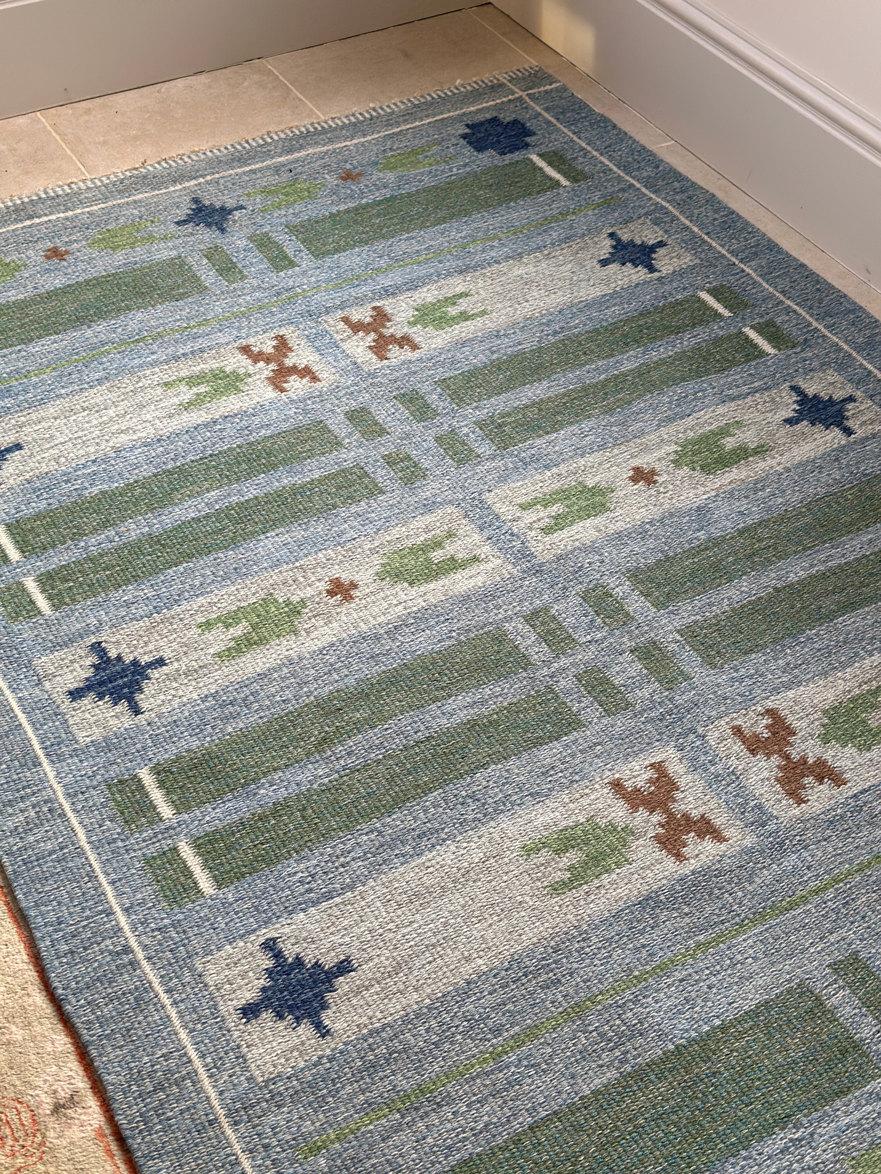 Swedish vintage kilim in blues and greens.