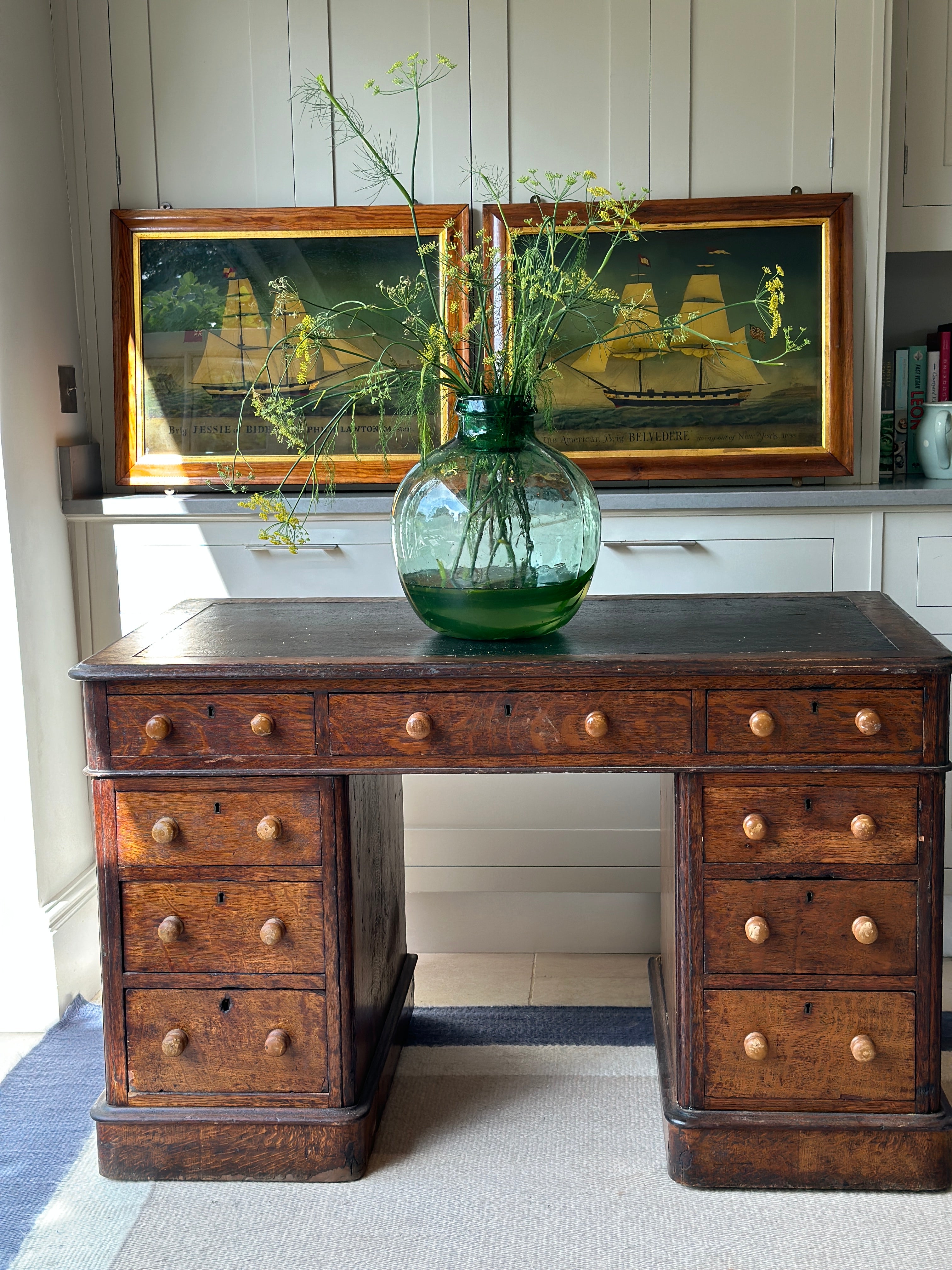 Antique Oak Desk with leather top on castors