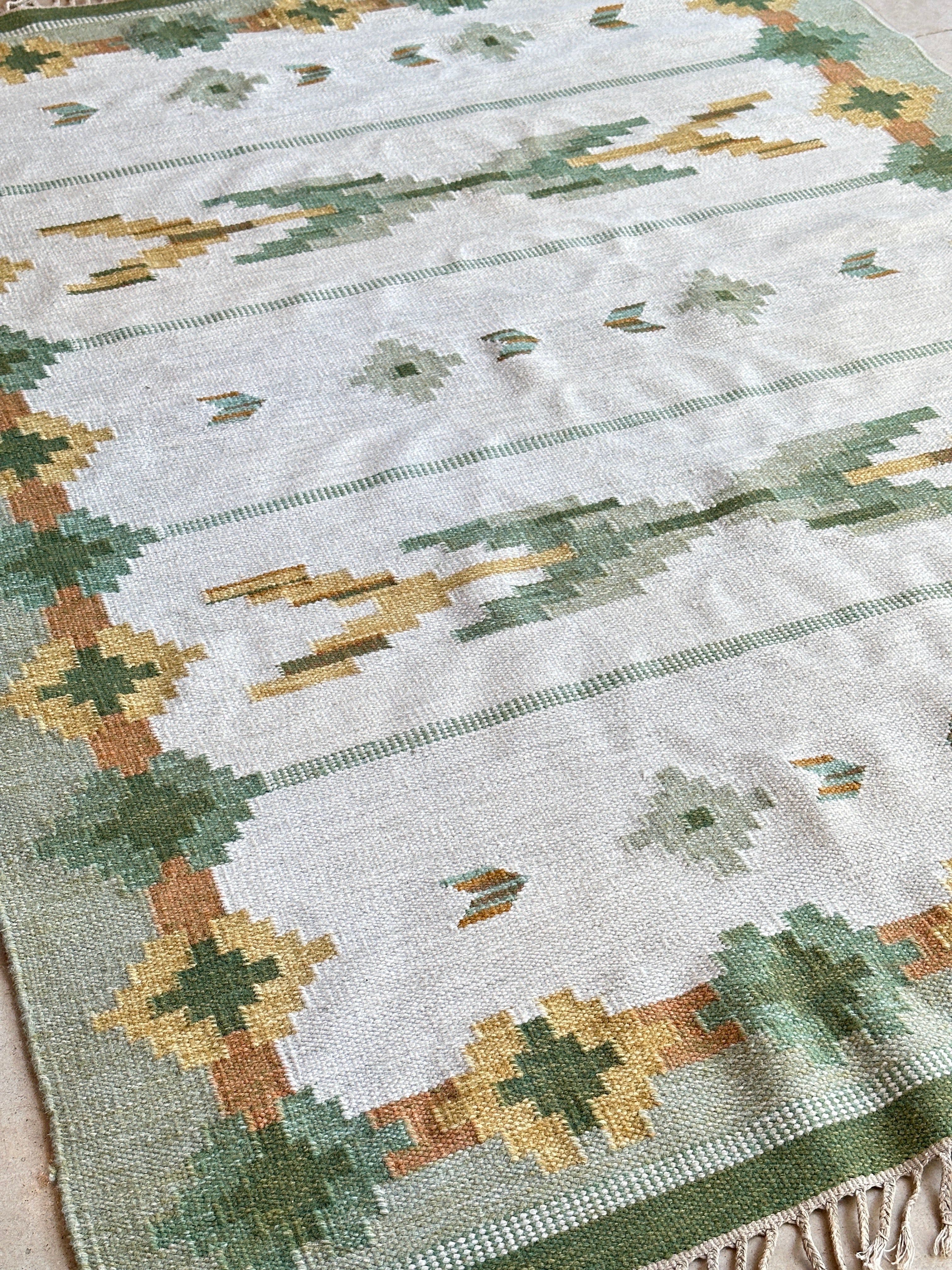 Vintage Swedish Flat Weave rug with green tones.