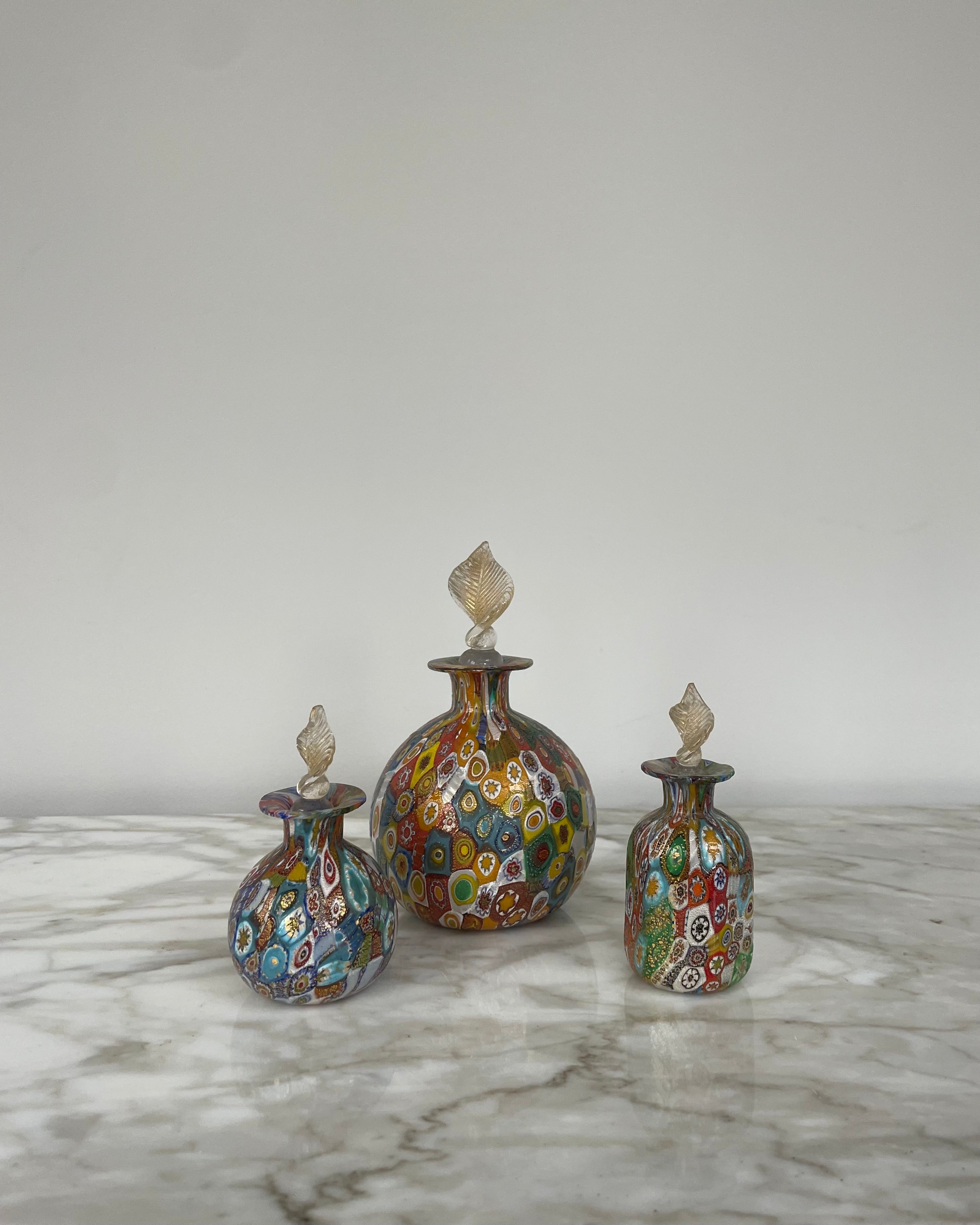 A Collection of 3 Murano Scent Bottles