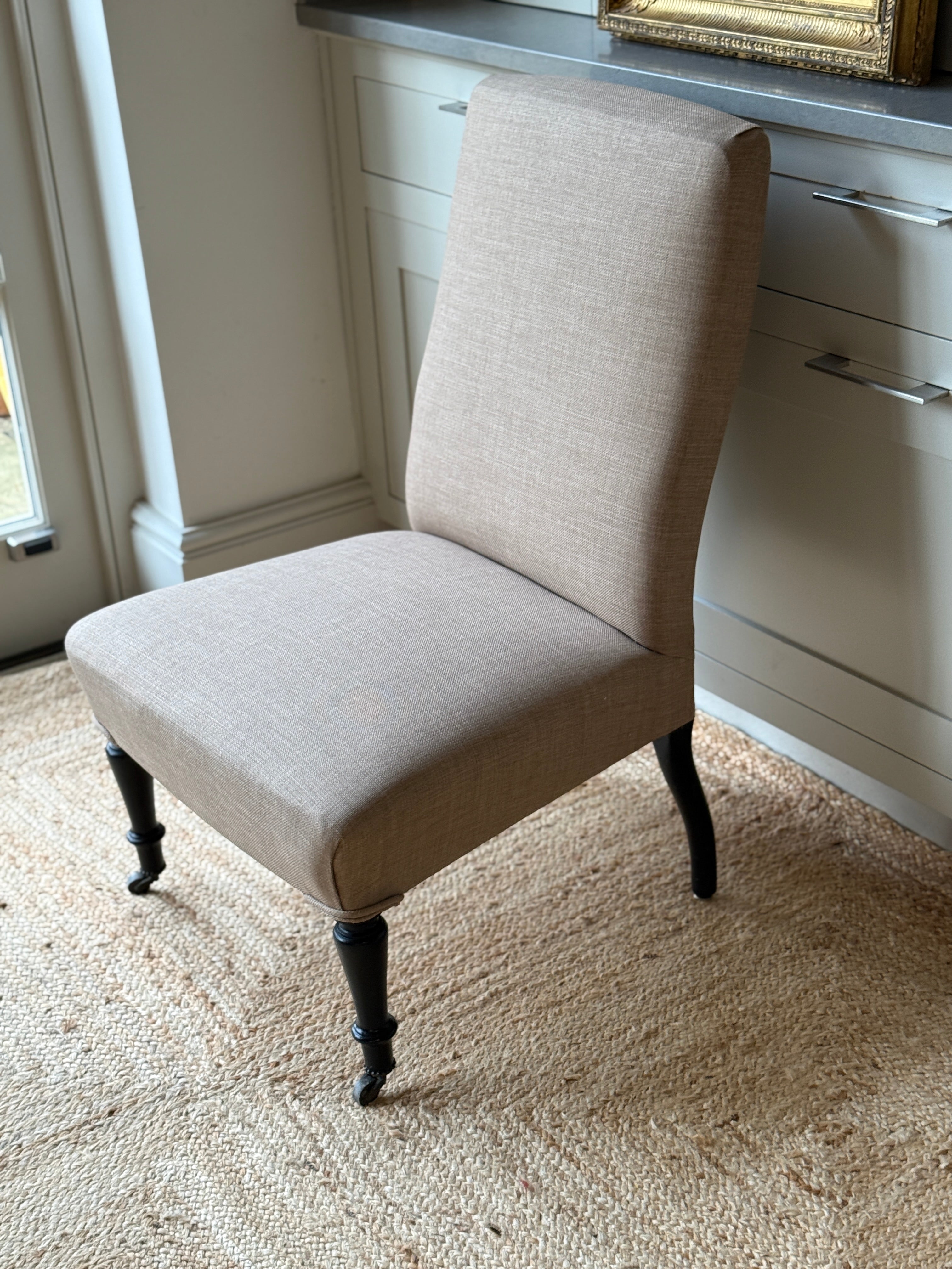 Late 19th Century Slipper Chair in heavy beige linen.