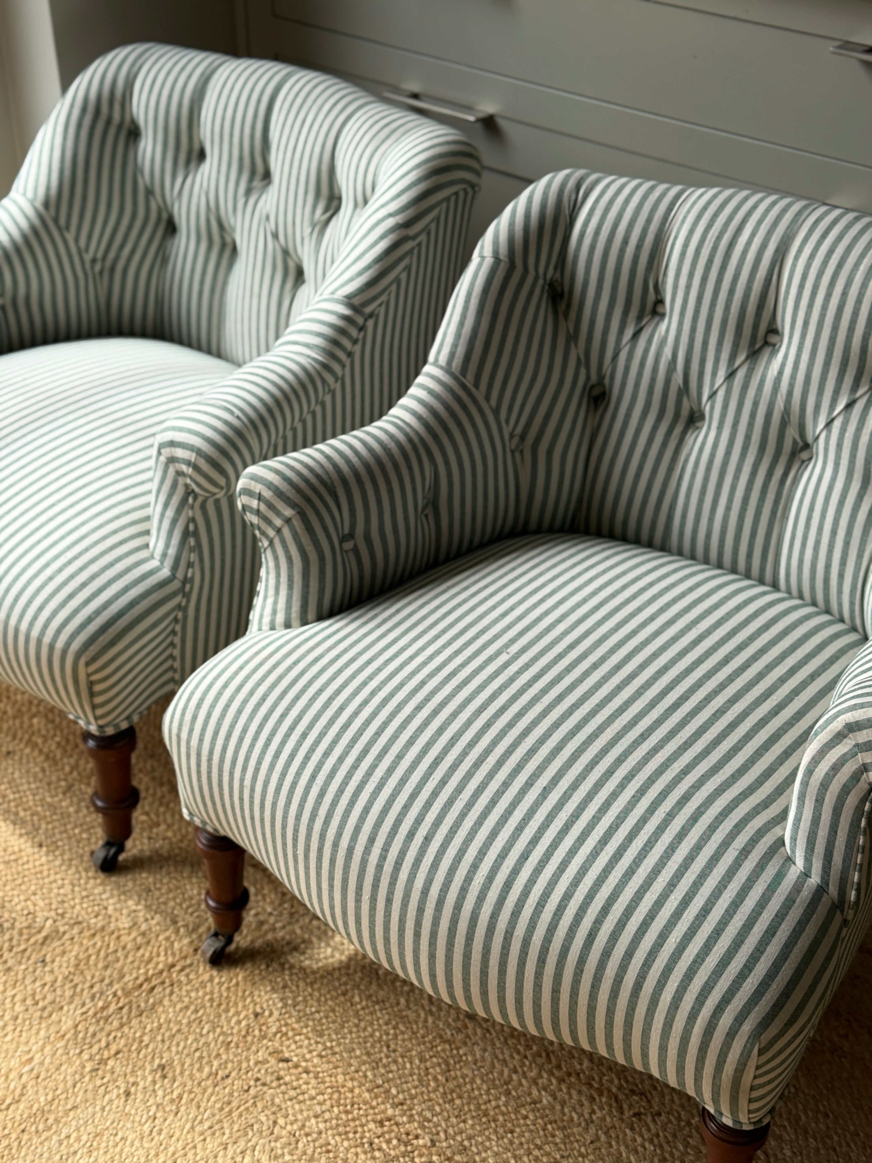 A Pair of French Napoleon III Button-Back Fauteuils