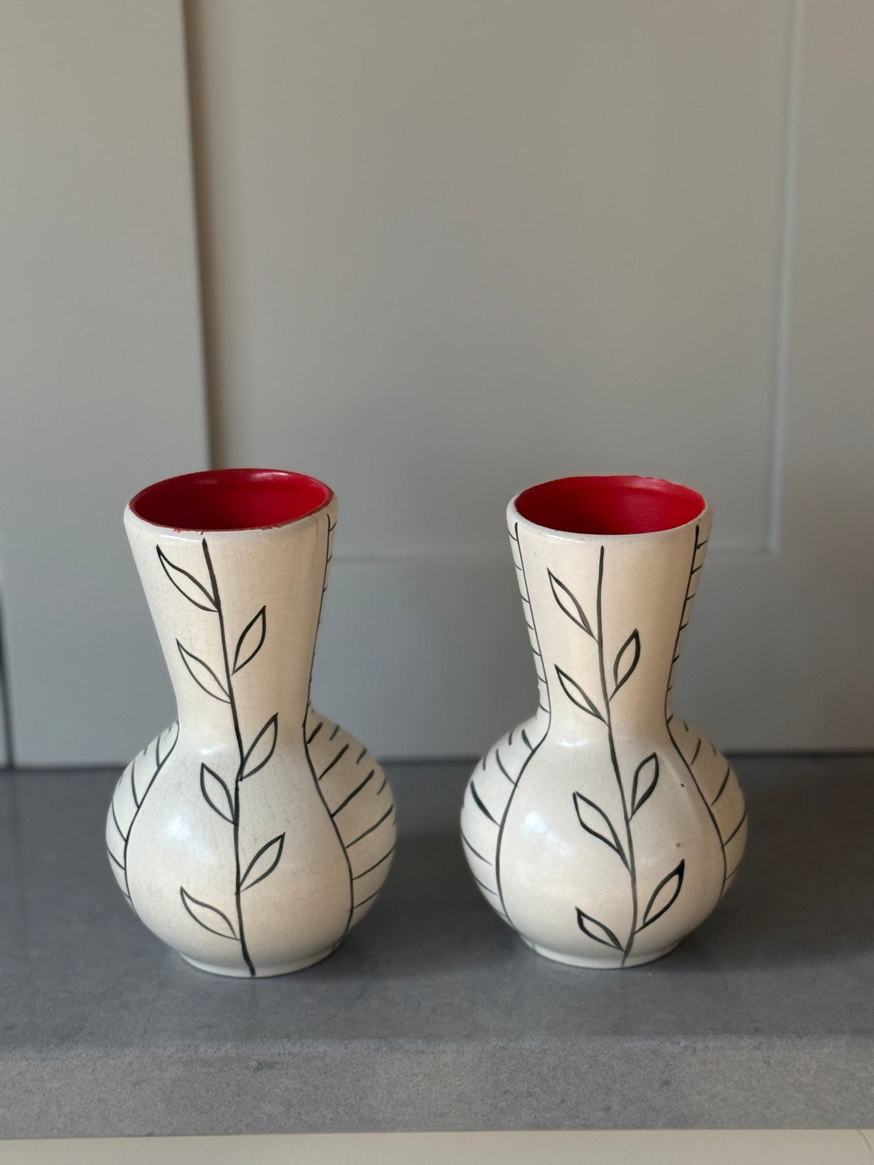 Pair of Small White Cerac Vases