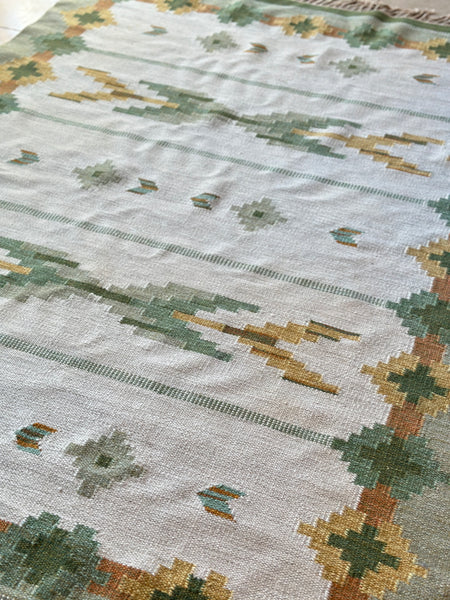 Vintage Swedish Flat Weave rug with green tones.