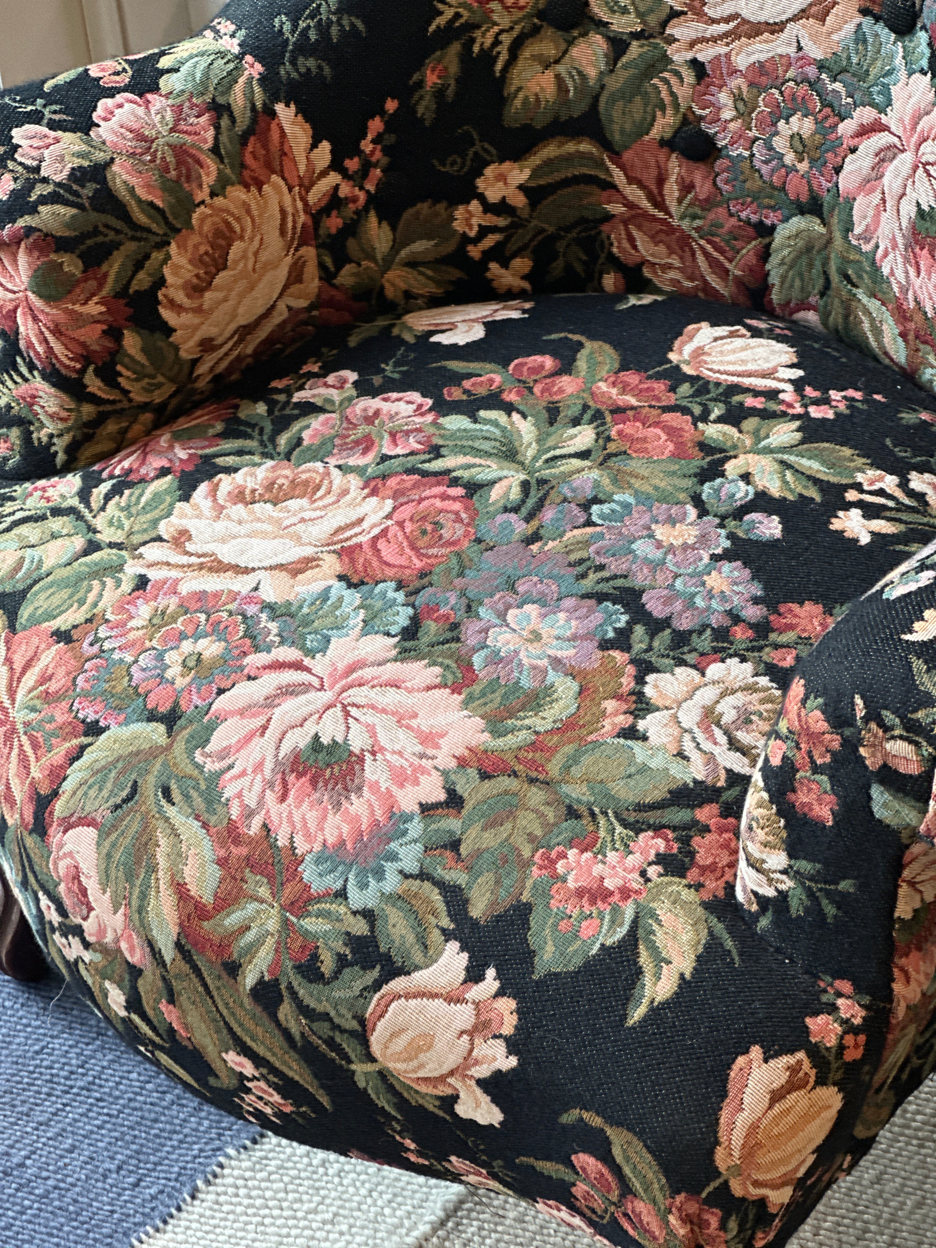 Pair of French Tub Chairs with original black floral tapestry fabric.